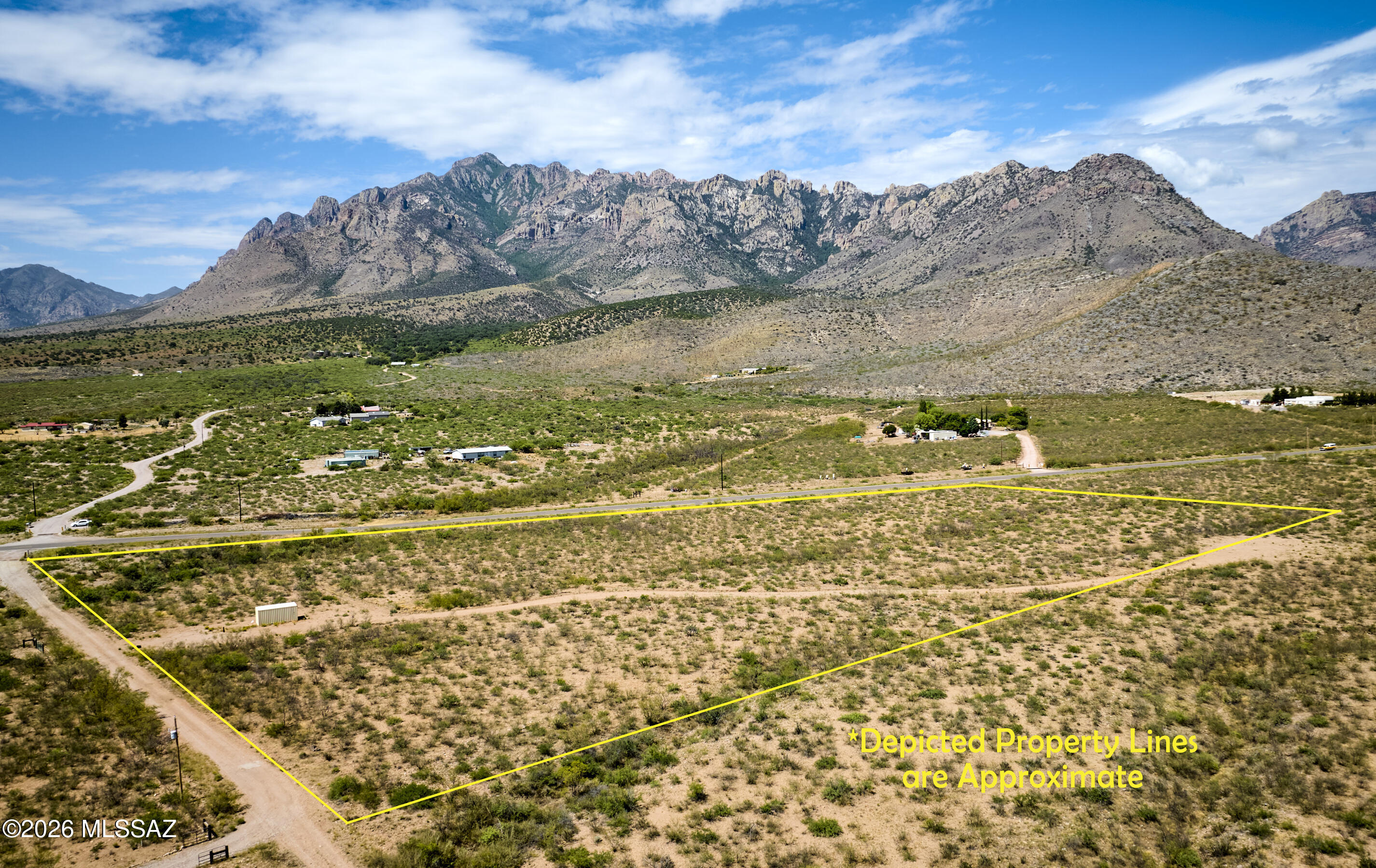 Enjoy epic mountain views of the Chiricahuas from 7+ acres in Portal, AZ - the Yosemite of Arizona!  Grid power on property line along Acacia Ln and at Portal Rd., 250' well with 10 GPM. Property features desert vegetation (mesquite and acacia). Zoned RU-4.  This is a great investment opportunity. 4 miles to Portal Peak Lodge & Cafe, 4 miles to birding and hiking in Cave Creek Canyon.  Portal is known for its abundant wildlife, dark night skies, hiking trails, and world class birding.