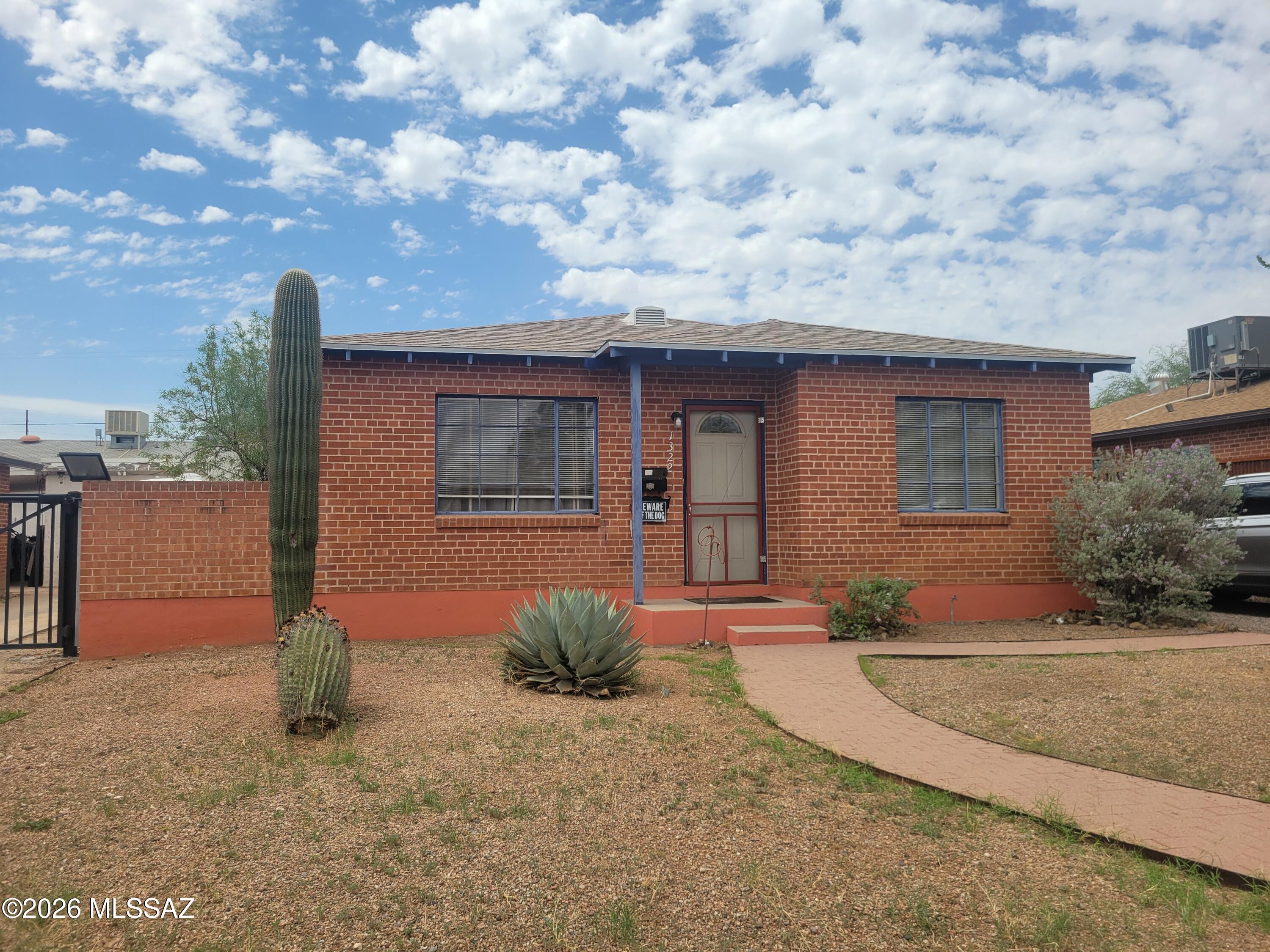 This 3 bedroom and 1 bath home is located in the heart of Tucson right next to the UofA and UMC Hospital.  The cute bungalow home was built in 1952 and is full of charm.  An additional workshop building is located in the backyard.  Lots of additional space in the backyard to build an additional guest house, as you commonly see with other properties in the area.  Perfect for UofA staff or student as one could walk right to the UofA from here.