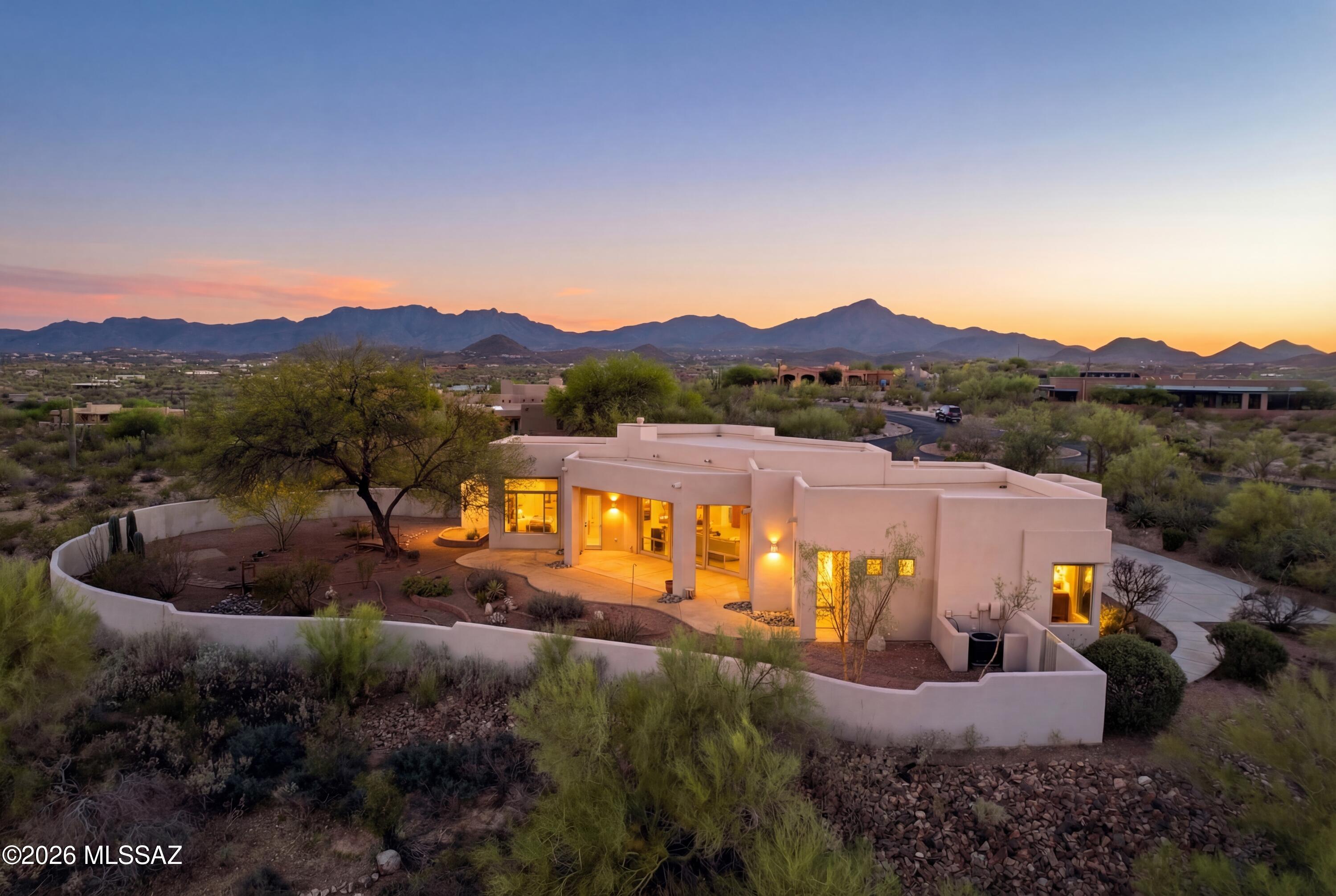 Stunning views and privacy await you at this semi custom home in the Tucson Preserve!! This single level split floor plan with lots of natural light just needs your cosmetic touch.