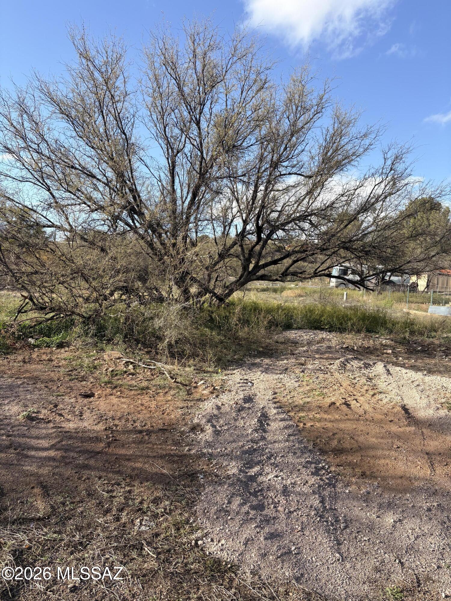 Level lot with sewer service in the heart of Rio Rico. A fantastic spot to build your new home, just minutes from fitness and walking trails.