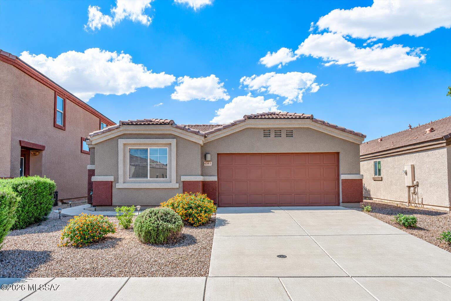 Come see this spacious 3-bedroom, 2-bath home with an additional 4th flex room in a desirable private gated community of The Pines. Enjoy spectacular views of Sombrero Peak and breathtaking Tucson sunsets from your private back patio overlooking the fairway. If your a golf enthusiast, this neighborhood is nestled within the private community of Quarry Pines Golf Course. The large great room flows into the stunning kitchen, featuring a large island, extended-height cabinets, pantry closet, & beautiful views of the Tucson Mountains from the kitchen window. The 4th flex room has been transformed into your own private movie room! What a great space for entertaining family, friends, and young people. Imagine gathering together to watch your favorite sports team on the big screen, enjoying movi nights or creating a fun space for everyone to relax and enjoy. Currently set up as a private home theater, this fourth room can easily be adapted back into a flexible living space of your choice. The exterior of the home was recently painted in October, adding to its fresh, well-maintained appearance. There is a large community pool and a well maintained park with playground. This home is move-in ready and waiting for you to make it your own!