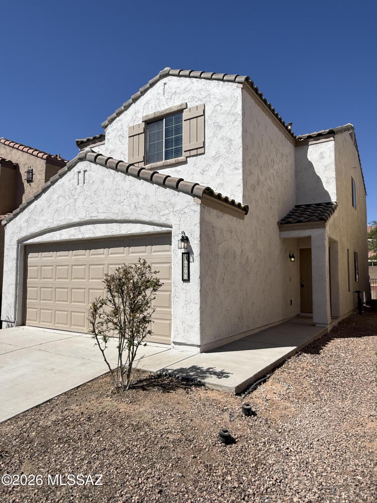 Don't miss this lovely two-story traditional in the popular Rancho Sahuarita community. Featuring 3 bedrooms and 2.5 baths, this home offers bright, flexible living areas, a comfortable primary suite and additional well-sized bedrooms. Enjoy a private backyard and easy access to Rancho Sahuarita amenities including parks, pools, walking trails, playgrounds, schools and nearby shopping and dining. Convenient location for commuting and everyday living.