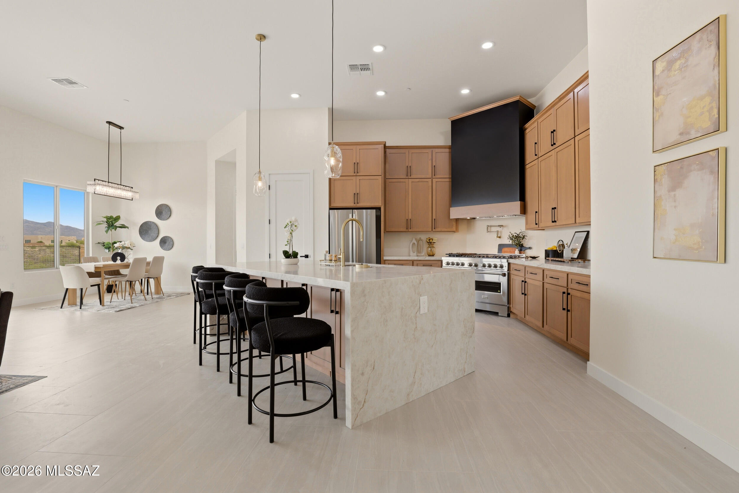 Experience modern luxury in this newly built residence spanning just under 3,000 sqft. This thoughtfully designed home offers 4 bedrooms, 3 bathrooms--including a secondary ensuite--and a spacious 3-car garage, all situated on an expansive 1.5-acre lot. 
The bright, open-concept layout features high ceilings and expansive windows that fill the home with natural light and showcase breathtaking views of the Rincon Mountains. The gourmet kitchen is equipped with a chef-inspired range, a large quartz island, and rich wood cabinetry, with elevated neutral finishes carried throughout the home. 
Come experience this beautiful home and its one-of-a-kind views for yourself.