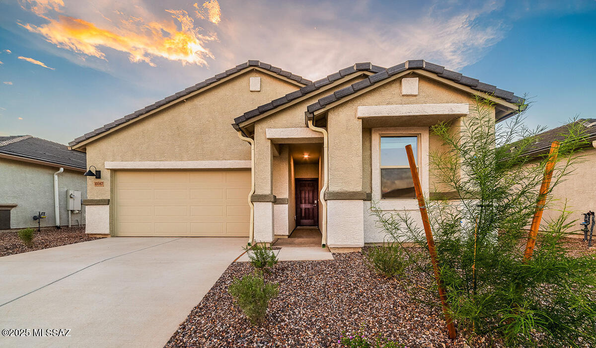 Welcome to The Easton, a thoughtfully designed single-story new home nestled within the inviting Saguaro Bloom community. With 1,697 square feet of living space, this home offers four bedrooms and two bathrooms, ideal for those seeking a blend of functionality and modern style.
As you enter through the front porch, the foyer opens up to reveal a spacious and open layout that flows seamlessly from the entryway to the living areas. The great room serves as the heart of the home, connecting effortlessly to the dining area and kitchen, making it a perfect space for both relaxation and entertaining. The kitchen is a chef's delight, featuring a central island, Quartz countertops, and Shaker-style cabinetry, providing ample storage and a sleek, modern aesthetic!