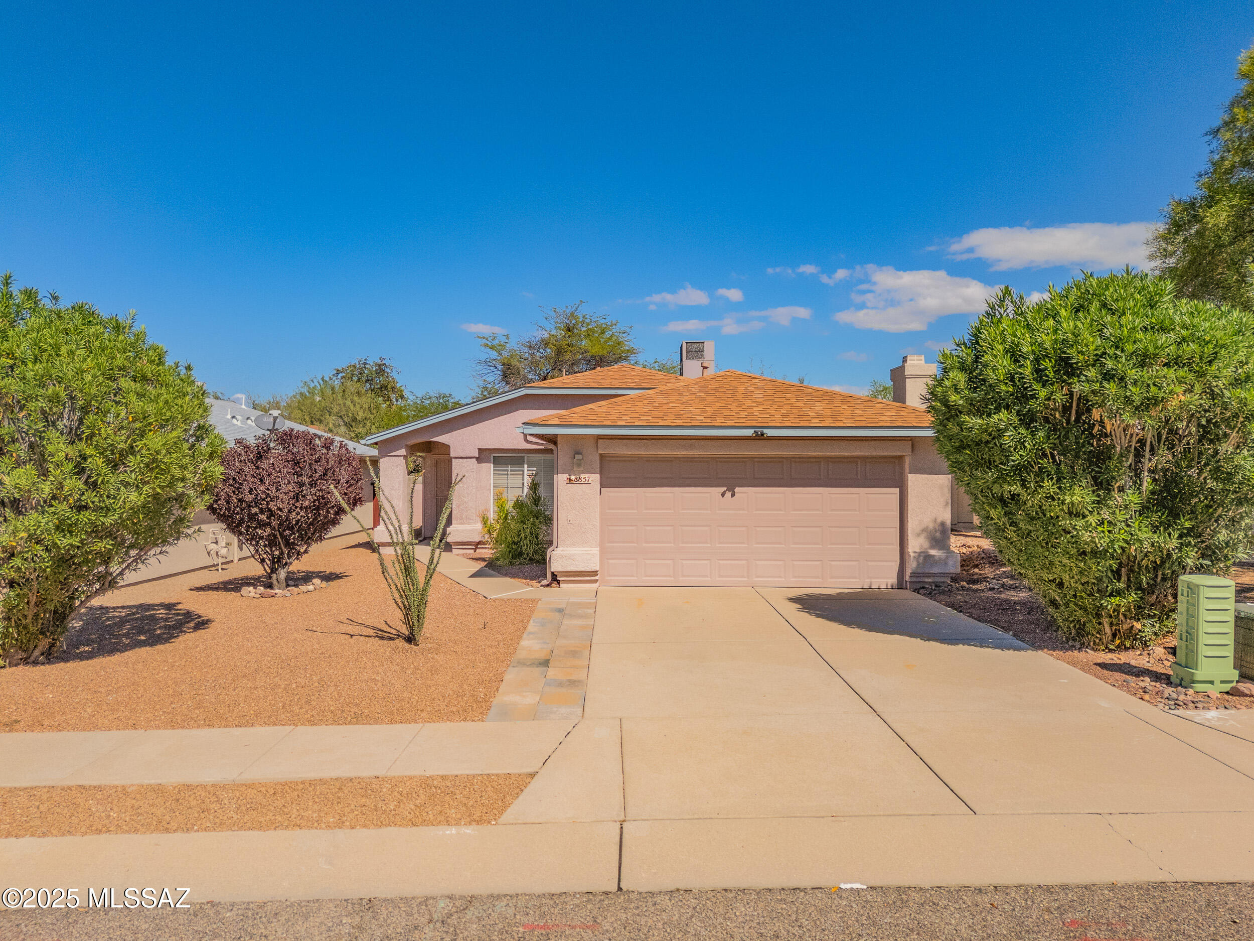 Welcome to Fruit Tree Dr--an inviting 3-bed, 2-bath Tucson home tucked on a quiet cul-de-sac. Featuring vaulted ceilings, tile floors, and abundant natural light, this open-concept layout flows from the kitchen to the covered patio for easy entertaining. Low-maintenance desert landscaping, and a private backyard retreat. Conveniently located near parks, schools, and shopping, this home offers comfort, value, and peace of mind--all in one move-in-ready package.