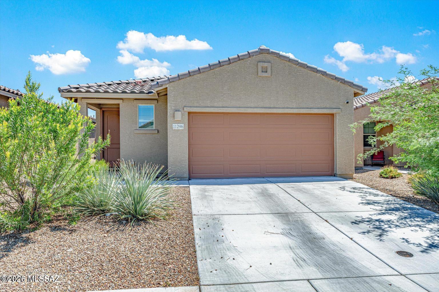 This beautifully maintained Meritage HOME offers modern living with no rear neighbors for added privacy. This single-story home features a desirable split bedroom plan with 3 bed, 2 baths, and a spacious great room layout with ceramic tile and upgraded vinyl plank flooring throughout. The stylish kitchen showcases slate cabinetry, granite countertops, stainless steel appliances, a gas range, and a center island with breakfast bar. Low maintenance backyard with mountain views and artificial turf. Additional highlights include a 2-car garage, energy-efficient construction, and a prime location within the highly acclaimed Vail School District with convenient access to I-10. Looking for Tenants to make 3X Rent, 600+ credit, No evictions, No ongoing Criminal Cases. Call about Pets