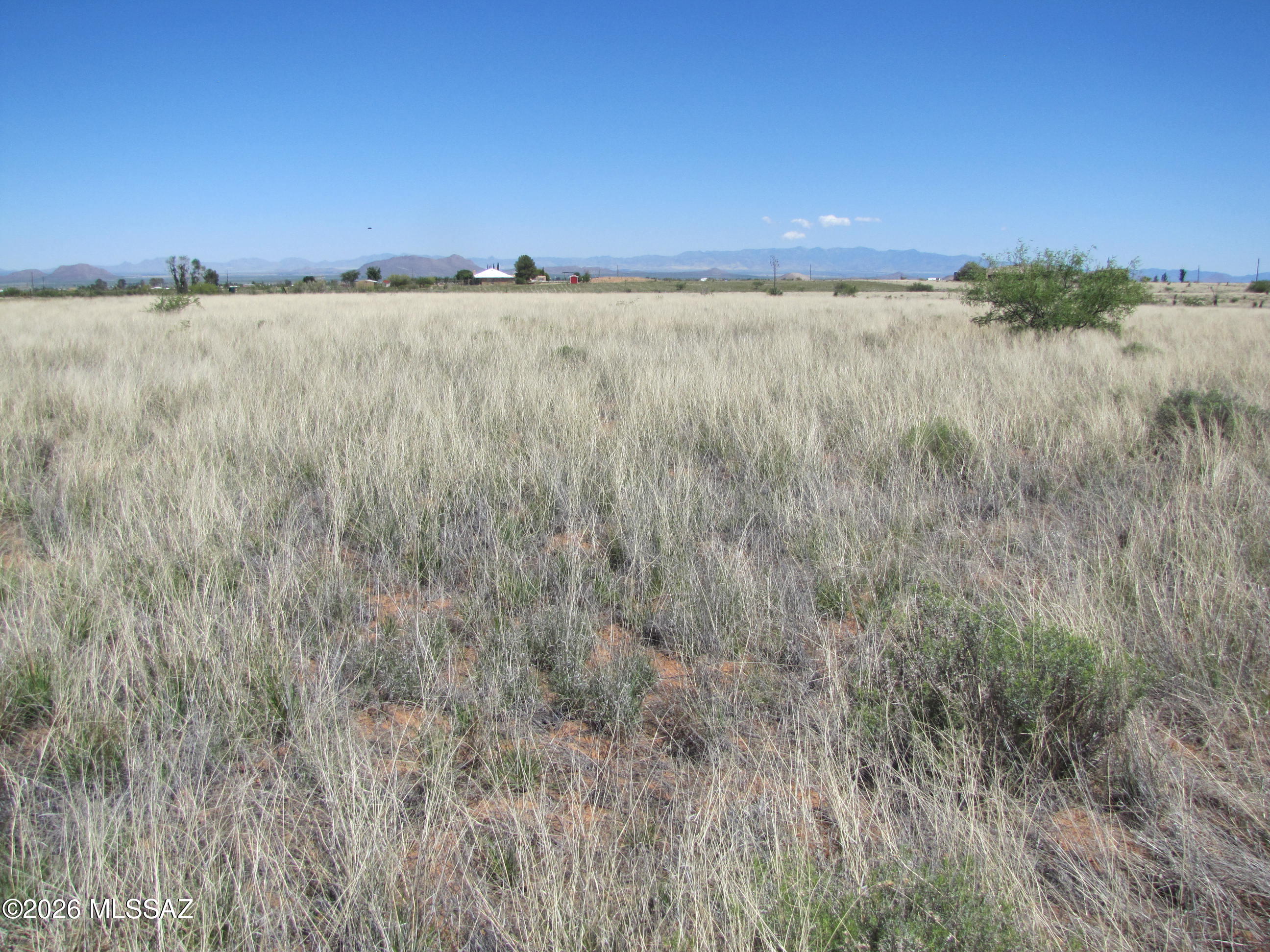 Exceptional and unimpeded views of Cochise Stronghold and the Coronado National Forest in the Dragoon Mountains. This 13+ acre parcel has electric at the property line, 1/5 well share, fiber optic internet from local phone cooperative, sweeping views of more of the Sulphur Springs Valley, and is partially fenced. Less than a mile off paved road giving easy access to I-10 and Hwy 191. Located a few miles from the friendly village of Sunsites with its amenities. Dark starry nights and cooler desert temperatures.