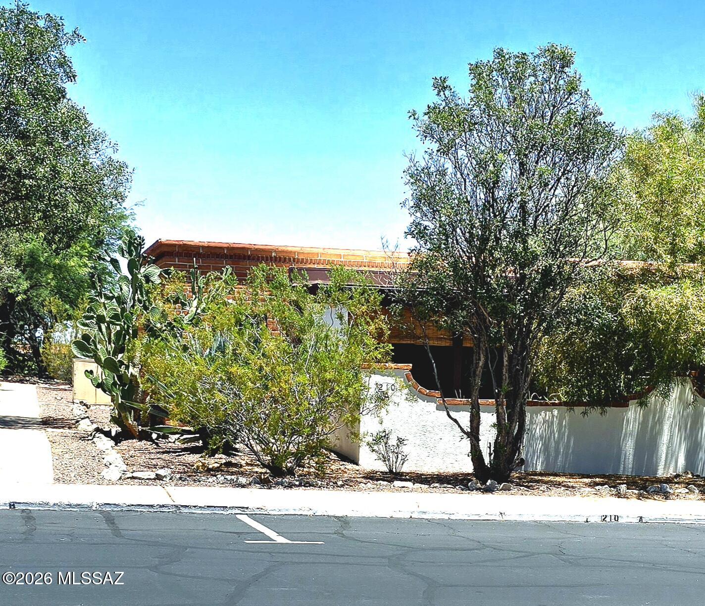 Move right into this beautifully furnished, completely remodeled 2026 home offering stylish, low-maintenance living in desirable 55+ community. Every detail has been updated, including a stunning new kitchen w/granite countertops, Samsung SS appliances, 18'' ceramic tile flooring throughout, a beautifully remodeled bathroom w/a Re-Bath walk-in shower & rare but so convenient in-unit washer/dryer. Brand-new energy-efficient windows w/updated window coverings, fresh interior paint & a newer HVAC system (less than 2 yrs old) add comfort & peace of mind. Private, south-facing fenced patio w/landscaping & pull-down sunshades, plus new American Vision front door w/a security door. HOA provides exceptional value by maintaining exterior, roof, water heater, HVAC, water, sewer, trash & 2 comm pools Green Valley Recreation membership offers access to 13 recreation centers with endless opportunities for fitness, social activities, clubs, and classes. Conveniently located just minutes from shopping, dining, and the farmers market, this turnkey home is ready for you to enjoy!