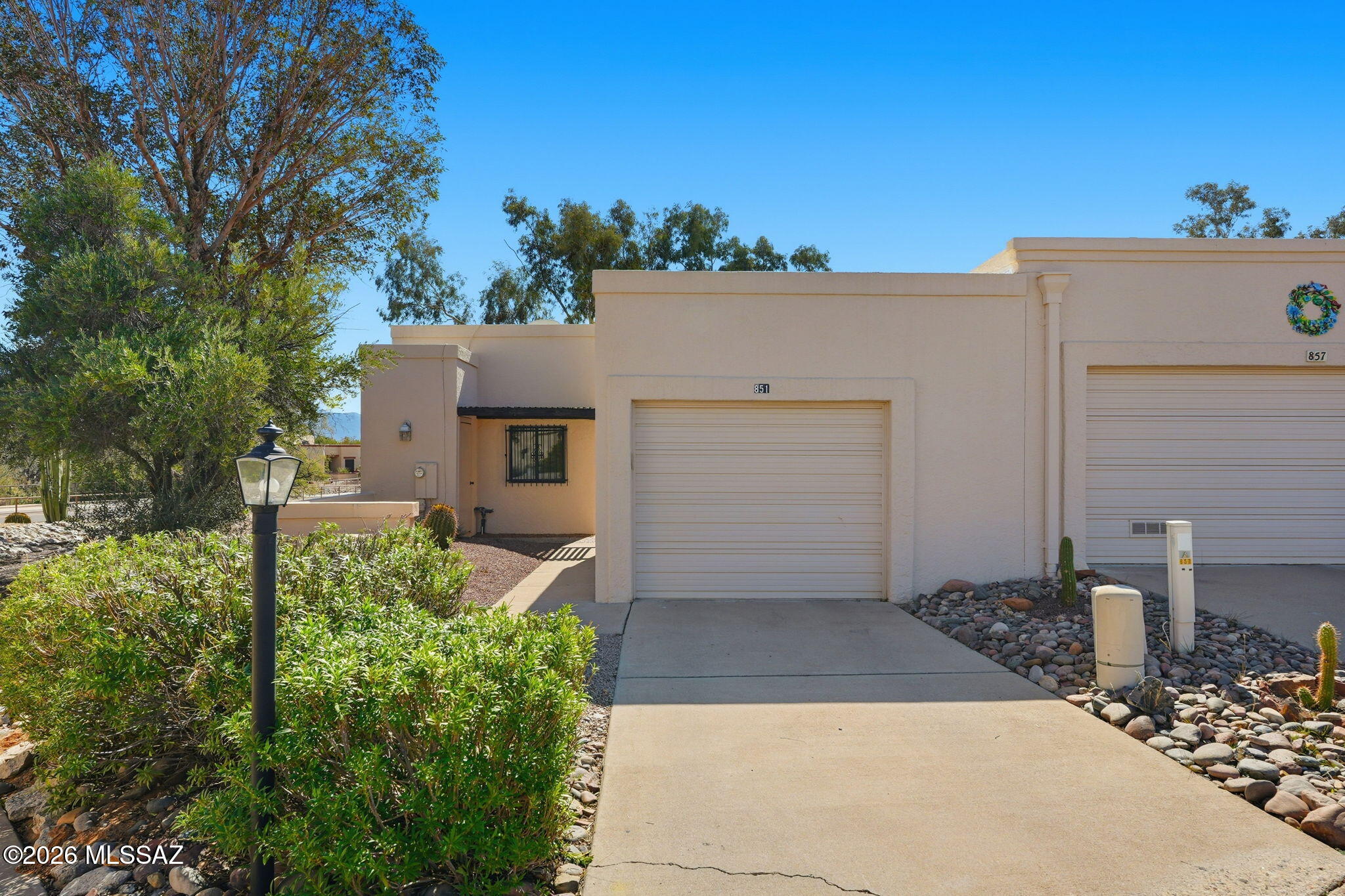 Clean, crisp, and completely move-in ready in the heart of Green Valley! This beautifully maintained townhome in Madera Vista offers stunning views of the Santa Rita Mountains along with the privacy you've been looking for.

Inside, you'll find new flooring and fresh interior paint that create a bright feel throughout. The spacious living room features a cozy gas fireplace, skylights that fill the space with natural light, and new sliding glass doors that seamlessly connect indoor and outdoor living.
The kitchen is light and inviting, complete with new stainless steel appliances and a charming kitchen nook, perfect for morning coffee. The home also includes new Anderson windows, providing exceptional energy efficiency and remarkable sound reduction for peaceful living. Additional upgrades include a 2023 NEW HVAC system for year-round comfort and a laundry room equipped with a new washer and dryer plus a convenient built-in desk area.
This home truly checks all the boxes privacy, views, and thoughtful upgrades throughout. Just bring your belongings and start enjoying Arizona living at its finest!