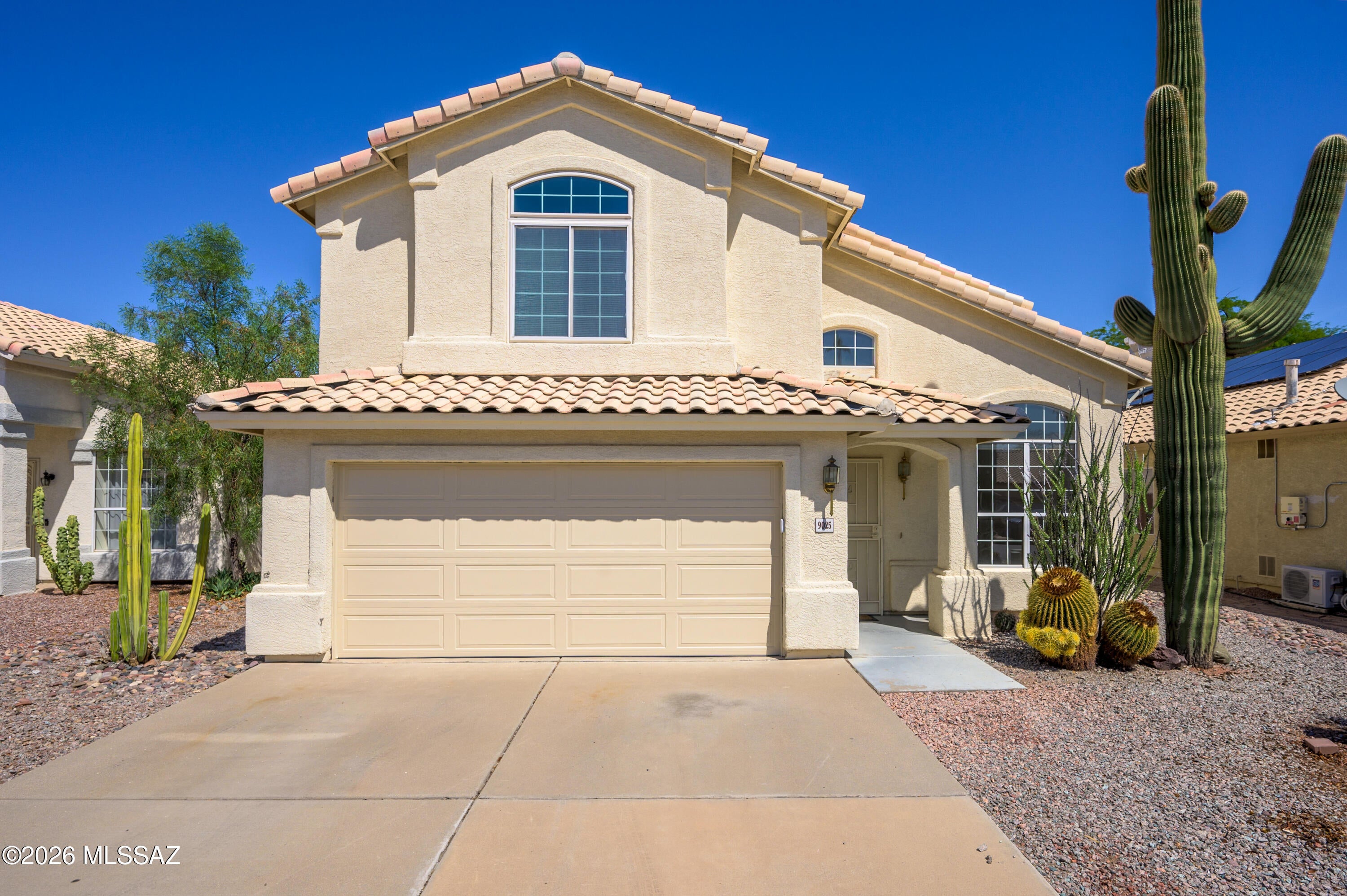 Thoughtfully designed for both everyday living and entertaining, this Continental Ranch home is filled with soaring ceilings, abundant natural light, and spacious gathering areas. The versatile floor plan features both a formal living room and a comfortable family room, offering plenty of space to relax or host guests. The kitchen is the heart of the home with granite countertops, stainless steel appliances, a pantry, and ample cabinetry. Upstairs, you'll find three spacious bedrooms and a versatile loft, perfect for a home office, playroom, or media space. The primary suite offers a peaceful retreat complete with a spacious walk-in closet, dual sink vanity, a separate soaking tub, and a separate walk-in shower. The backyard is designed for easy living with low maintenance landscaping, a spacious covered patio, and a combination of mature trees and shrubs that provide beauty and a welcoming outdoor atmosphere. The roof was replaced approximately four years ago, providing added peace of mind. Everything you've been looking for comes together perfectly in this beautiful home. Located in the highly desirable Continental Ranch community in Marana, residents enjoy an exceptional lifestyle with two community pools, neighborhood parks, playgrounds, sports fields, picnic areas, and miles of walking and biking trails that connect throughout the community. Nearby Continental Ranch Community Park offers additional recreation with tennis courts, pickleball courts, a skate park, and expansive open green space. Conveniently located near shopping, dining, schools, golf, and I-10, this home offers the perfect blend of comfort, convenience, and outstanding community amenities.