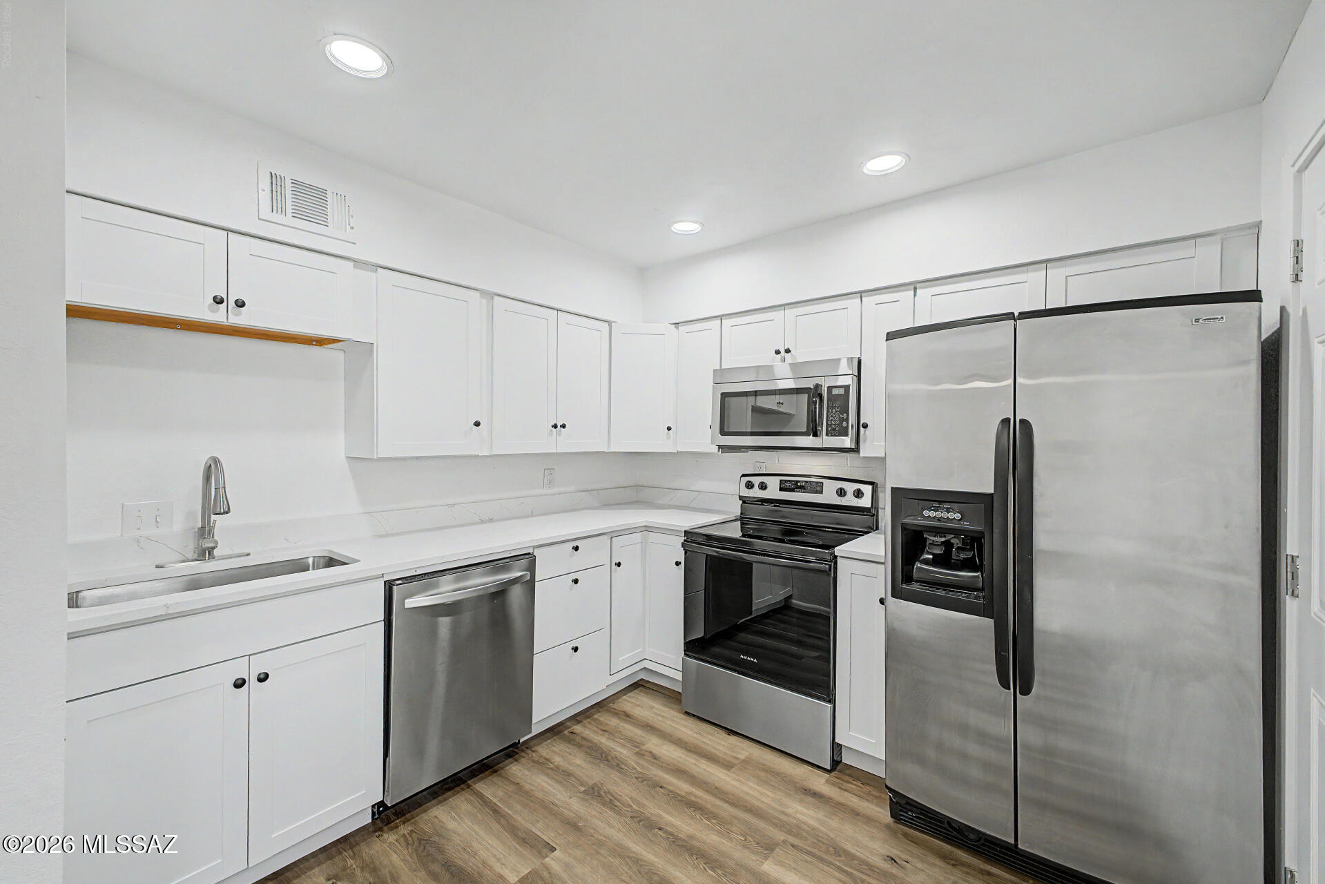 Fully Remodeled & Move-In Ready! Expect to be impressed by this stunning, completely updated townhome featuring a bright, freshly painted interior, brand-new plush carpet, and a modern kitchen complete with new cabinets, sleek quartz countertops, and durable laminate flooring. Enjoy ultimate comfort and total peace of mind with a brand-new A/C unit, along with the convenience of an in-home washer and dryer. Located just steps away from the sparkling community pool, this turnkey property offers the perfect blend of style, convenience, and low-maintenance living?schedule your tour today!