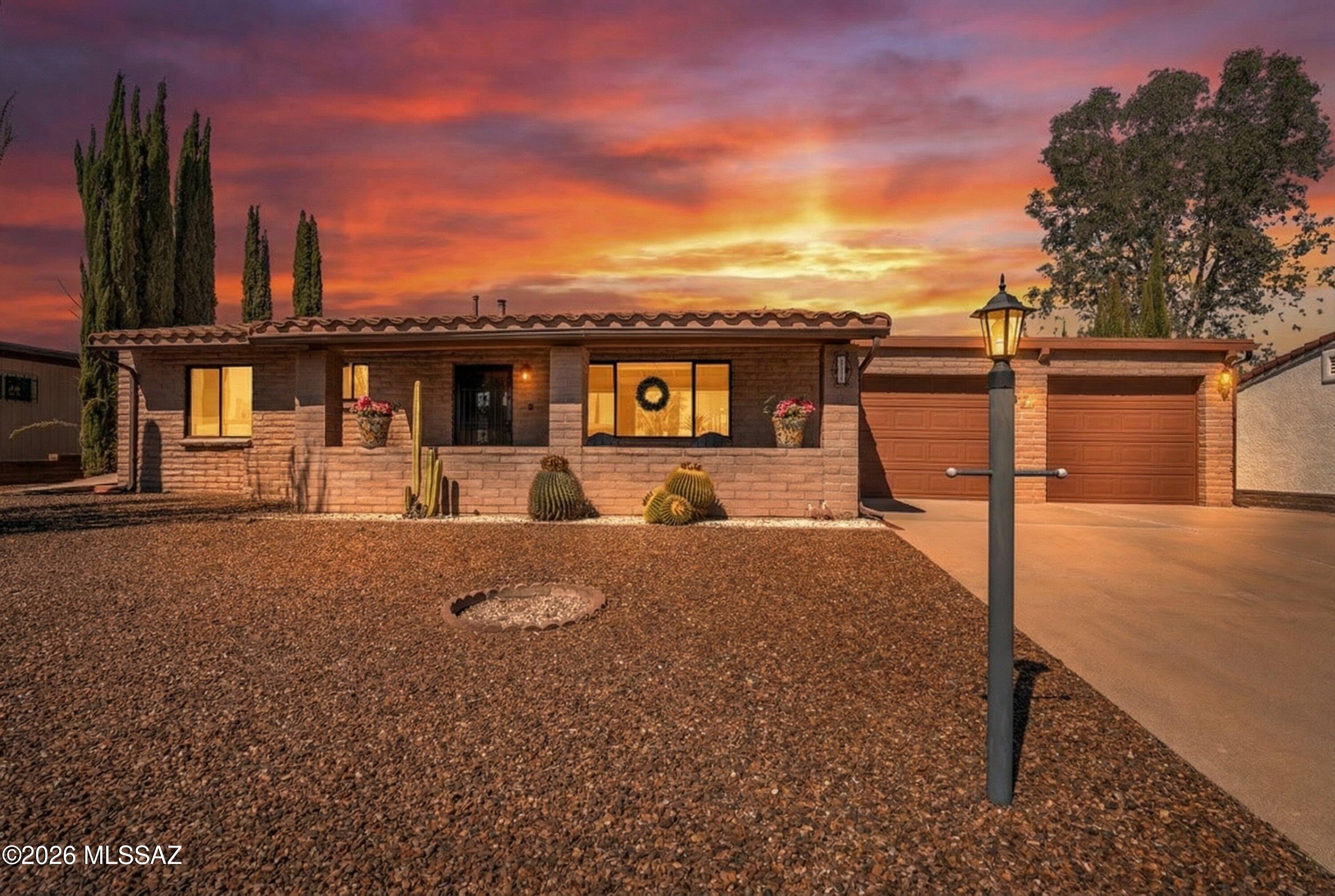 Furnished, 2 car garage, and private backyard!  

This charming brick home offers beautiful mountain views and a welcoming front porch perfect for relaxing and enjoying Arizona's stunning desert scenery. Located near Desert Meadows Park, you'll have easy access to walking paths and a scenic portion of the historic Anza Trail, while the surrounding area is framed by beautiful golf courses.
Inside, the home feels bright and inviting with neutral flooring and comfortable living spaces designed for easy, low-maintenance living. The floor plan includes an Arizona room, a versatile bonus room, and an oversized laundry room that adds convenience and extra storage.
A two-car garage and a large private backyard provide additional space to enjoy the outdoors while keeping maintenance simple. Membership to Green Valley Recreation gives you access to 14 recreation centers offering pickleball, swimming, billiards, fitness facilities, clubs, and a wide variety of activities.
Most furnishings are available with home sale, making this a convenient and easy move-in opportunity. This well-maintained home is ready for its new homeowner to enjoy the relaxed Green Valley lifestyle.