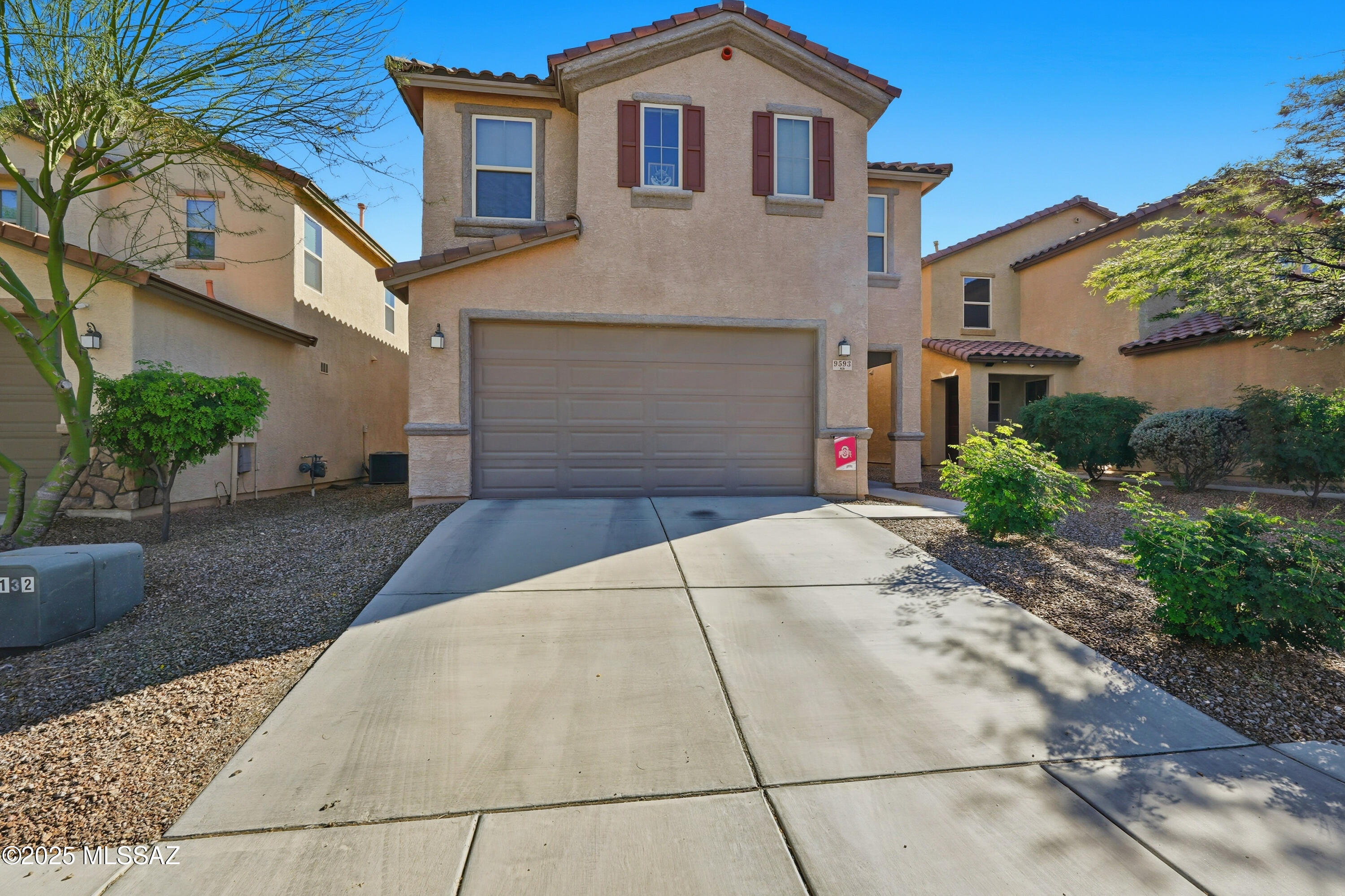 Summer is the perfect time for a fresh start, and this spacious Mountain Vail Estates home is ready for its next chapter.

Built in 2018 and meticulously cared for by its original owners, this 5-bedroom, 3-bathroom home offers 2,657 square feet of thoughtfully designed living space in one of Vail's most desirable established neighborhoods.

Why buy new construction when you can have the best of both worlds? Enjoy the modern design, energy efficiency, and open floor plan of a newer home while skipping the dust, noise, construction traffic, and uncertainty that often come with developing communities. Here, the neighborhood is complete, the streets are established, and the backyard is already finished and ready to enjoy. Inside, the flexible floor plan offers room for everyone. The downstairs bedroom and full bathroom are ideal for guests, multi-generational living, or a private home office. The open-concept kitchen, dining, and living areas create a welcoming space for everyday living, holiday gatherings, and everything in between.

Step outside to a private, fenced backyard where kids can play, pets can roam, and weekend barbecues can become a tradition.

Conveniently located near shopping, dining, parks, and top-rated Vail schools, this home offers the space you need and the location you've been looking for.

For added peace of mind, the sellers are including a home warranty plan up to $700.00 

Move in before the school year begins and start enjoying everything this exceptional home has to offer.