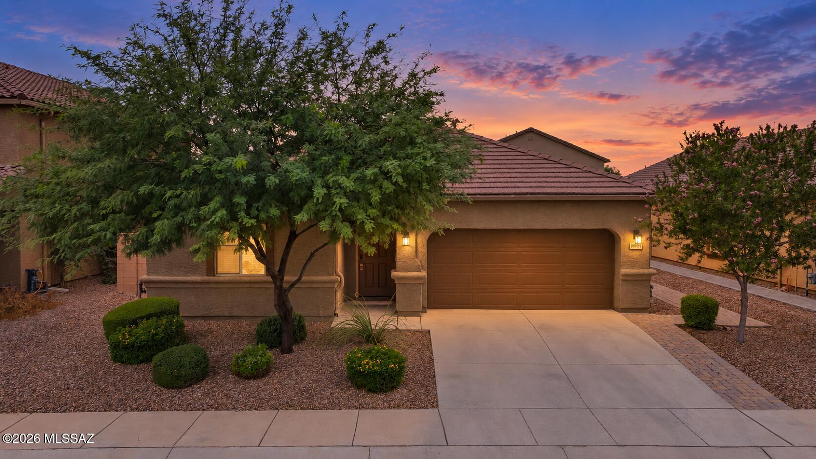 Turnkey and move in ready, this 5 bedroom, 3 bathroom home offers 2,259 square feet with fresh interior paint, new artificial turf, brick pavers, updated backsplash and countertops, tile surround at the primary bath, and all new appliances. Professionally cleaned and ready for its next owner. Located in the Saguaro Bloom master planned community with pools, parks, walking paths, recreation areas, fitness center and clubhouse. Convenient access to I-10, Arizona Pavilions, Cortaro shopping, dining and everyday amenities.