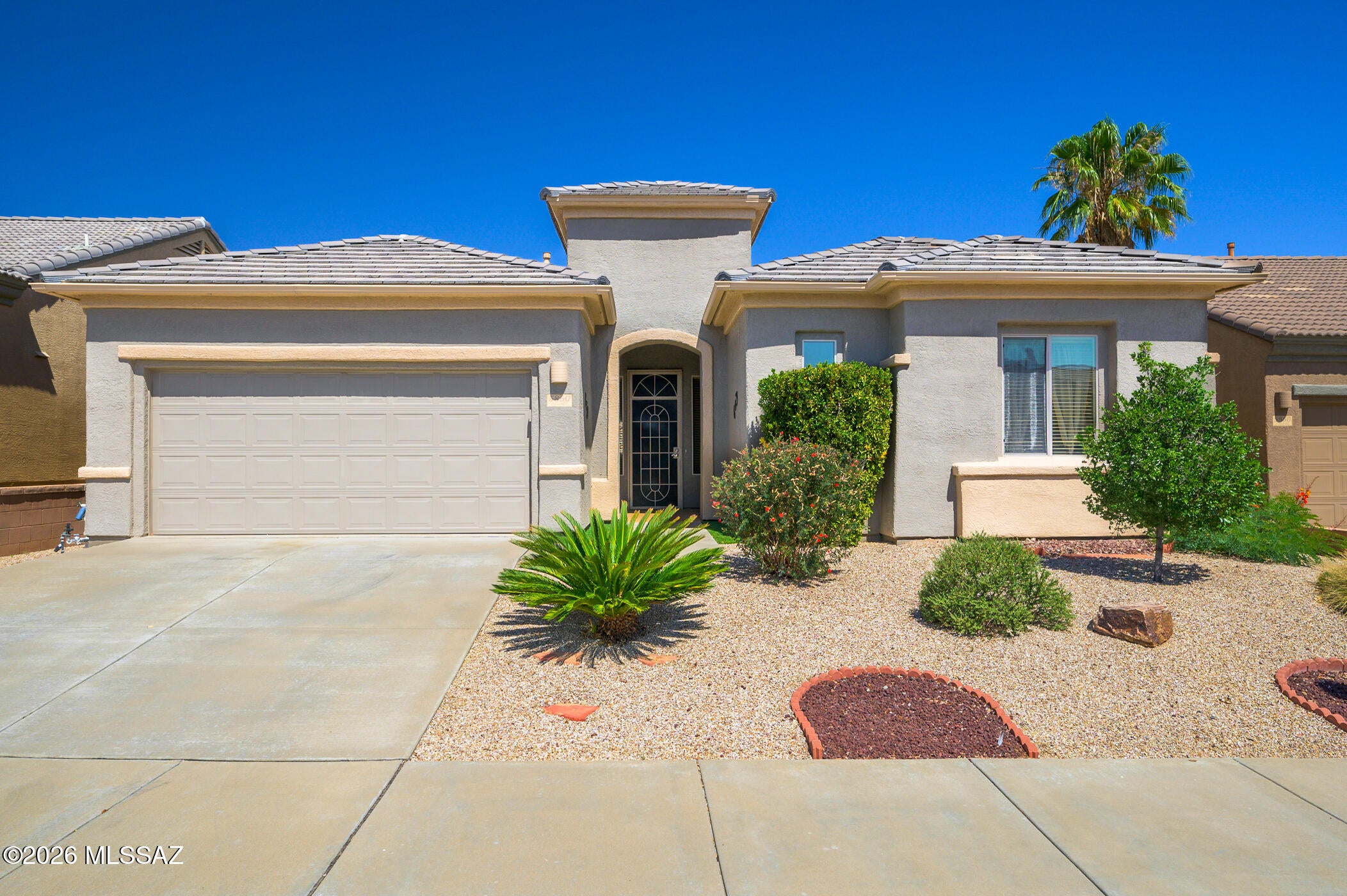 Minutes from everywhere that Matters!  Perfectly situated just moments from one of Green Valley's largest recreation centers, with easy access to state-of-the-art fitness facilities, arts & crafts, social clubs, and countless activities. Beautifully maintained by its original owner the flexible Vega floor plan is a popular design allowing for office or hobby room, in addition to guest room. The open concept design keeps kitchen, dining and living connected while the covered patio with a drop down screen creates the feel of an enclosed private retreat while staying open to the breeze. In addition, the extra length garage upgrade allows for long bed trucks and other toys. Did I mention the dining and golf resort?