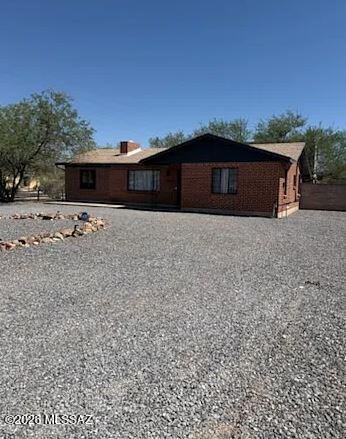 Beautiful 3BR/2BA home situated on a desirable corner lot in an amazing central Tucson location just off the Mountain Ave bike path. This home offers quick access to the University of Arizona, grocery stores, parks, shopping, restaurants, and more. Hardwood flooring runs throughout most of the home, adding warmth and character, while the private primary suite features its own entrance and stylish concrete floors. The updated kitchen includes modern cabinetry and stainless steel appliances with plenty of workspace for cooking and entertaining. Step outside to a walled backyard with an extended covered patio and drop-down shades, perfect for enjoying Tucson evenings. Plenty of off-street parking available in the front driveway area. Small dogs welcome. Call today to schedule a showing!