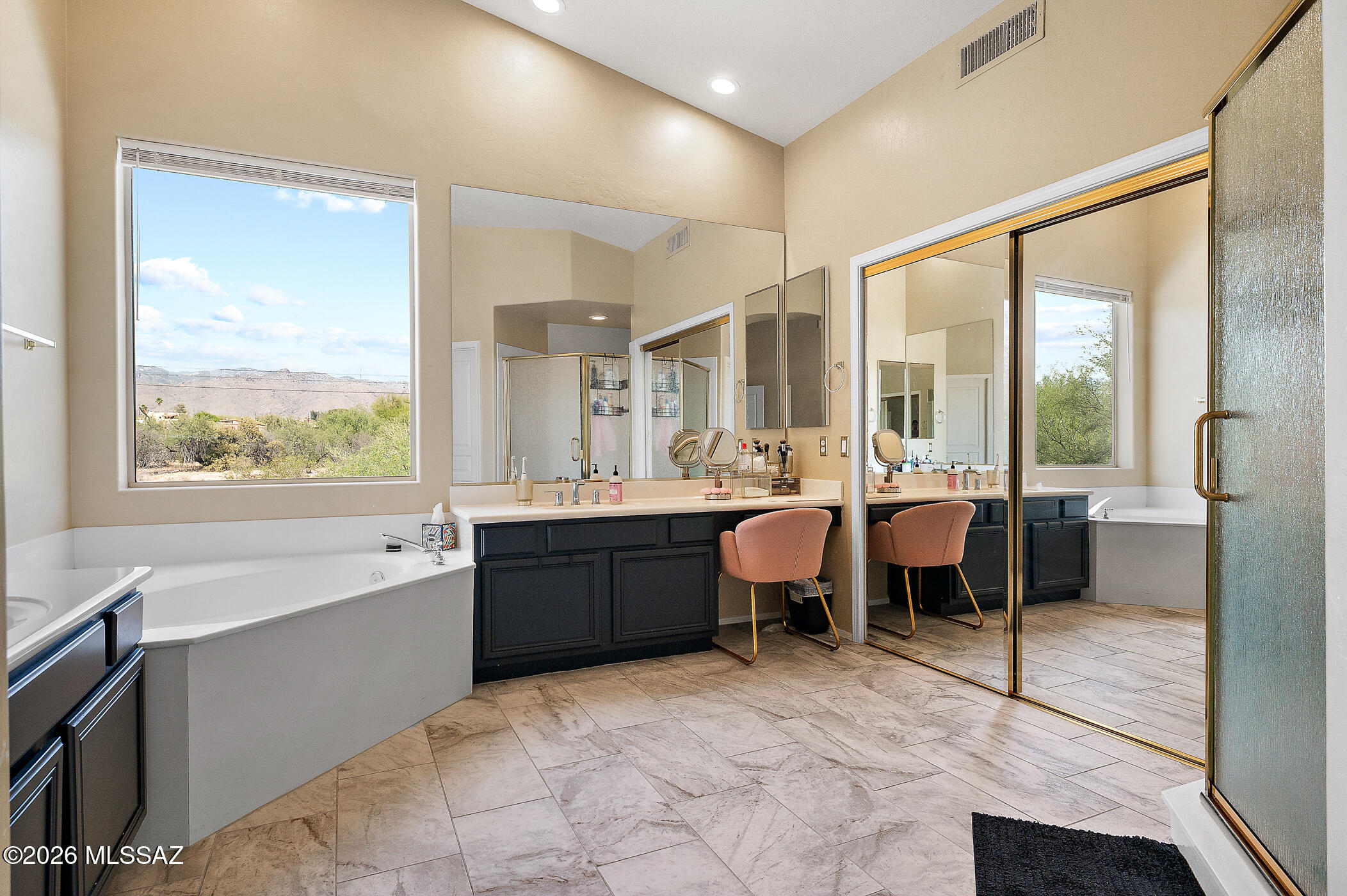 Welcome to one of the most unique subdivisions in all of Southern Arizona! The Lakes at Castle Rock offers 14 lakes, 2 pools/spa, and a huge Rec center. Located within the gated community and towards the end of a cul-de-sac is a house with roughly 75k in updates that separates itself from most. Right upon entering you are engulfed into luxury and spaciousness, with an expansive living room, high ceilings and natural light coming in. Installed in 2023 you have beautiful earth-toned Luxury Vinyl Plank flooring that provides a soft yet modern balance among the fresh paint, stand-out fireplace stone facade, and the kitchen Quartz counters with sexy backsplash. 

The home showcases a huge primary suite on the 2nd floor with a soaking tub, large walk-in shower, huge walk-in closet, and walk-in shower, huge walk-in closet, and magnificent Catalina Mountain views. A loft and three other bedrooms and guest bath upstairs. Most of the furniture conveys as well, with a few exceptions, including 2 fridges and a washer and dryer purchased in 2025. 

This home has a highly coveted 3-CAR garage for an extra toy or work area. Also includes a 240v electric car charger! The backyard is private w/ a fenced-in pool for those hot summers. And to make this gorgeous home even better, enjoy minimal electrical bills with completely PAID and OWNED solar. Modern fans, updated door hardware, plentiful storage, a built-in BBQ out back, low-care yards, and a distinguished and modern elegant look throughout, this home is a true winner. Call or text today for your own private tour!