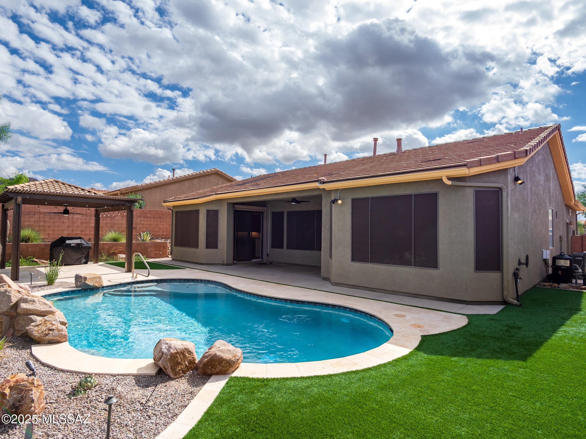 Text for a Walkthrough Video/more info. This 3 Bedroom/2 Bathroom + Family Room 2250sf Home located in Dove Mountain boasts a long list of Premium Amenities. Enjoy the preserved view of the Tortolita Mountains from the Pebble Tech Pool w/ Travertine deck surround + Shade Pergola. Upgraded Interior Features incl; Kitchen w/ Granite Countertops + Gas Range; Master BR Suite w/ Private Bath incl Dual Vanities, Soaking Tub, Shower, + Walk-in Closet; Ceramic Tile floors throughout + Carpeted BRs ; Plantation Shutters; Surround Sound; EV Charger, 3 Car Garage; Gas Fireplace, and Updated + Efficient HVAC units and Water Heater. Located in Marana Schools near Golf + Hiking/Biking Trails at Dove Mountain plus easy I-10 Freeway access. 1yr minimum Lease. Available for a November move in. Costs are: $50/adult Application, $3495 Security Deposit, $450 Cleaning Fee, $150/pet with Approved Pet. Tenant pays Electric, Nat Gas, Water, Sewer, Trash.