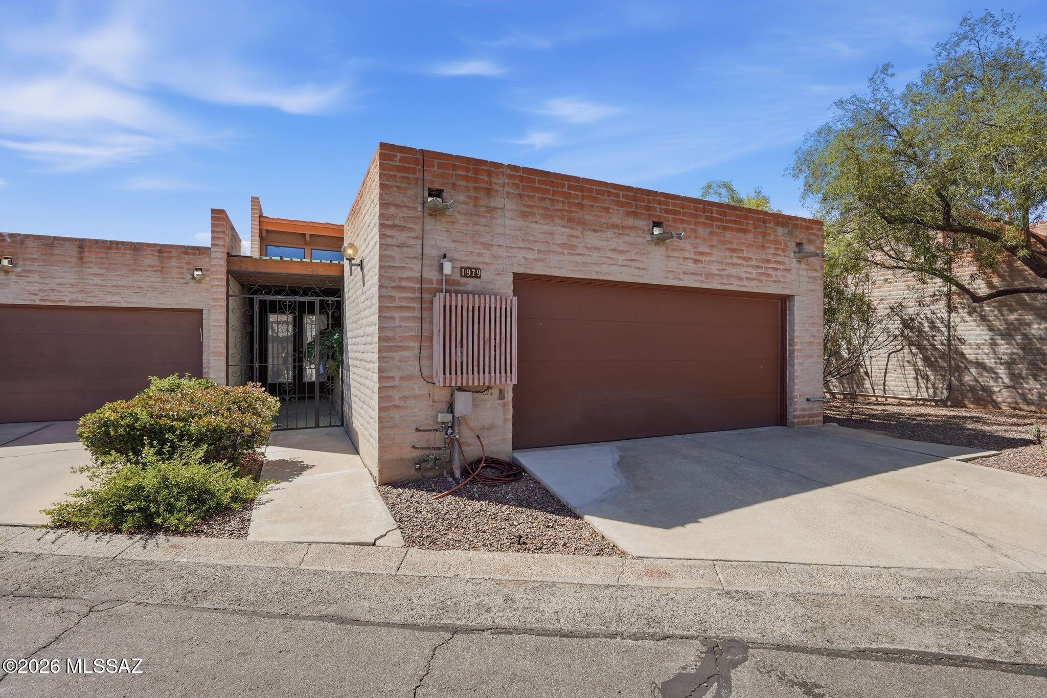 Stunning views of the Catalinas!! Upgrades galore! Beamed ceilings, gorgeous built-ins, end unit, views to the West and the North. With windows that are from the floor to the ceiling you feel like you're floating on air. Walk-in closets with custom cabinetry. This one has its own little gate to walk in the wash. The HOA pool is up on the hill and feels like your own private oasis. Property was a very successful Airbnb. Please reach out for more information.