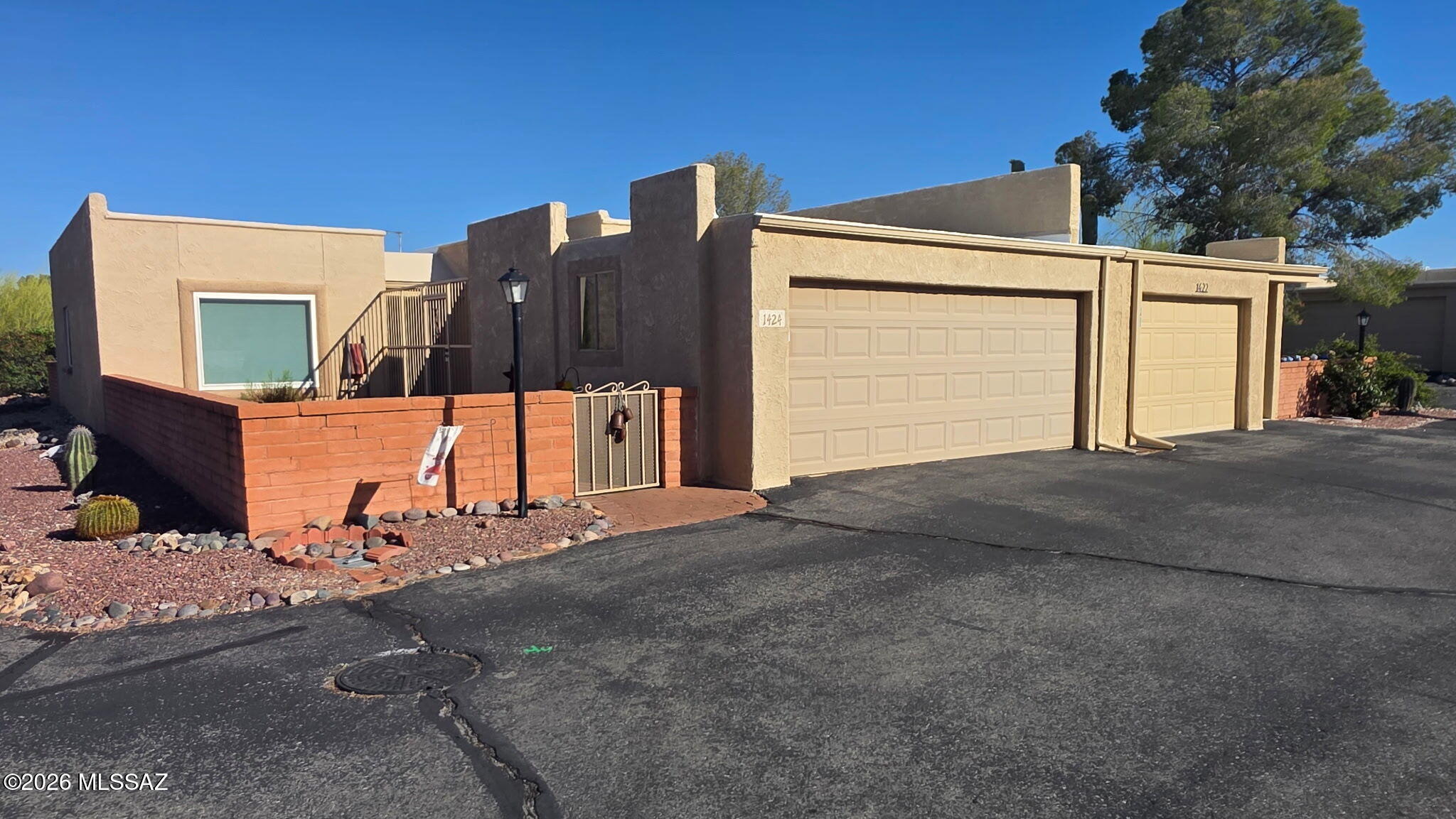 Welcome to this charming 2-bedroom, 2-bath townhome located in The Villages in Green Valley. Thoughtfully designed for comfort, style, and functionality, this home features numerous updates throughout. Enjoy 20x20 tile flooring that flows seamlessly throughout the home, complemented by beautiful granite countertops in both the kitchen and bathrooms. The kitchen is equipped with stainless steel appliances, while new windows and updated window treatments enhance both efficiency and style. A large security gate at the entry from the garage to the front door provides added privacy and peace of mind. The spacious primary suite offers a generous walk-in closet and a beautifully tiled walk-in shower, while skylights in both bathrooms fill the spaces with natural light. Step outside to a private walking path just beyond the back door--perfect for enjoying the serene surroundings and stunning mountain views.
Enjoy access to a wide range of GVR amenities and activities, all while being conveniently located just 20 minutes from Tucson International Airport. This inviting home perfectly blends comfort, convenience, and an active Green Valley lifestyle.