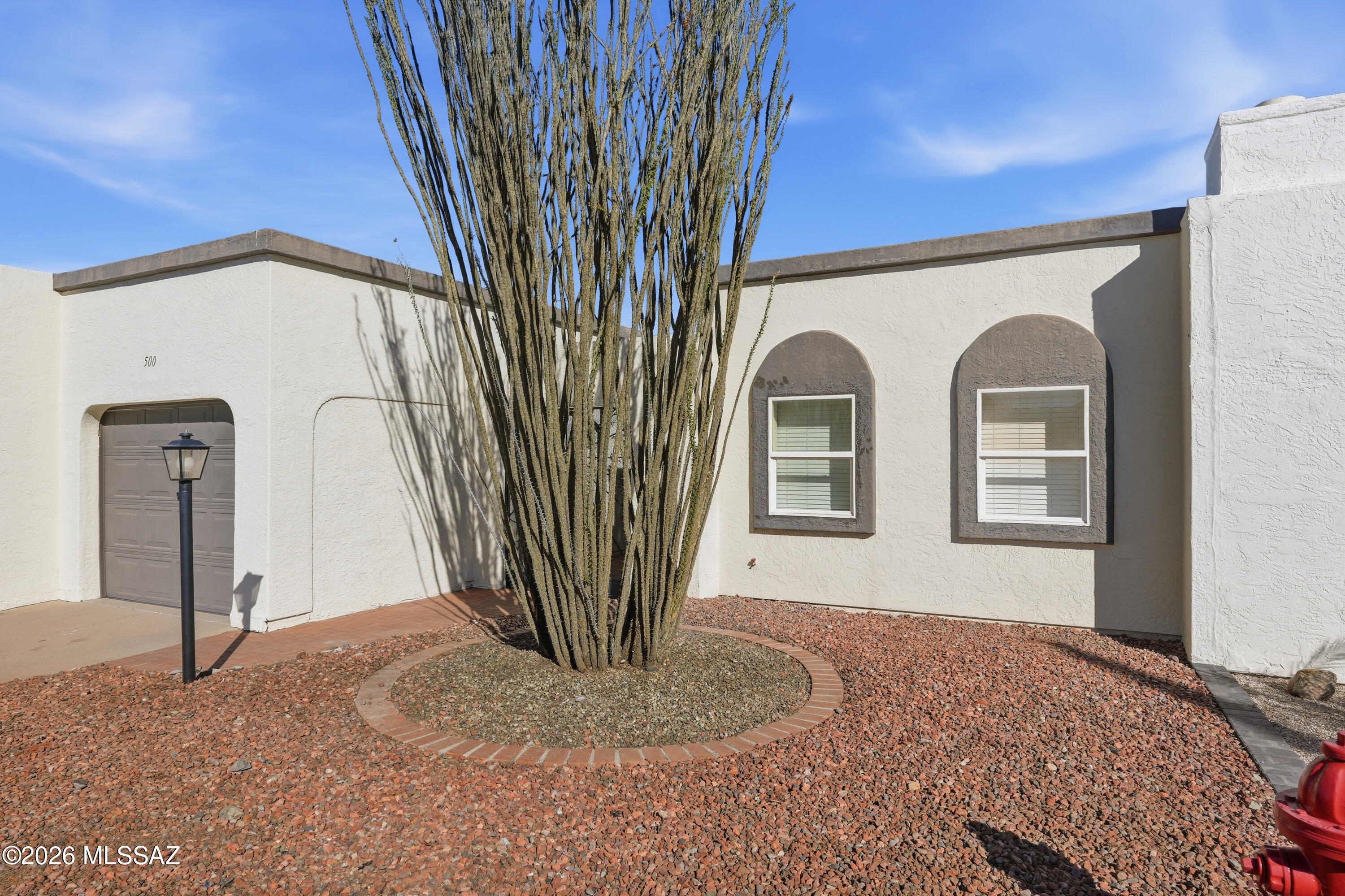 Wake up every morning to sweeping MOUNTAIN VIEWS that stretch across the horizon -- where the desert meets the sky. Nestled on a cul-de-sac in the Continental Vistas community, this beautifully appointed townhome offers the perfect blend of low-maintenance living and the wide-open Arizona lifestyle you've been dreaming of. From the moment you step through your private courtyard, the outside world fades away. Whether you're sipping your morning coffee or unwinding with an evening glass of wine, this tucked-away outdoor retreat is yours alone. With multiple outdoor spaces to spread out and soak it all in, this home was made for entertaining- gather your favorite people, fire up the grill, and let the breathtaking scenery do the rest. Inside, the thoughtful layout keeps comfort and convenience front and center. Two generously sized bedrooms and two full bathrooms mean plenty of space for guests, a home office, or simply room to breathe. And when the Arizona sun is doing what it does best, retreat to the stunning Arizona room -- that beloved, light-drenched bonus space that blurs the line between indoors and out, perfect for your art projects, relaxing, entertaining, or simply soaking in those jaw-dropping views year-round. A one-car garage keeps your vehicle protected and gives you that extra storage space every homeowner secretly craves. Location-wise, you simply couldn't ask for more. Everything you need is just minutes away -- shopping, dining, and healthcare. This is more than a home. It's a lifestyle -- serene, scenic, and completely within reach. Don't just imagine the mountain views glowing amber and rose. Come live it.