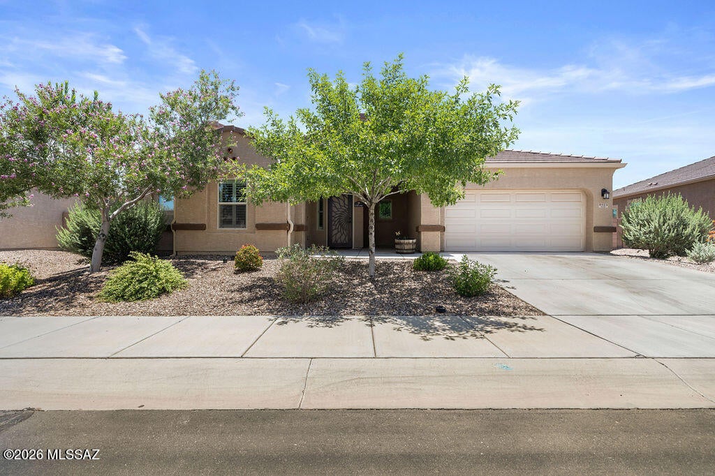 ASSUMABLE VA LOAN at 2.25% OWNED SOLAR! This beautifully upgraded single-level home was designed for easy, low-maintenance living in the quiet, scenic 55+ community of Saguaro Springs. Built in 2019, this 2-bedroom plus den, 2-bath home offers a thoughtfully designed split floorplan with nearly 1,900 sq ft of open living space. You'll love the spacious great room, plantation shutters throughout, and the chef's kitchen with granite countertops, stainless steel appliances, and a generous island -- ideal for entertaining or hosting family. Enjoy peace of mind with an owned solar system, water softener, reverse osmosis, and a tankless gas water heater -- all contributing to comfort and energy efficiency. The large den is perfect as a hobby space, office, or even a guest room when needed.