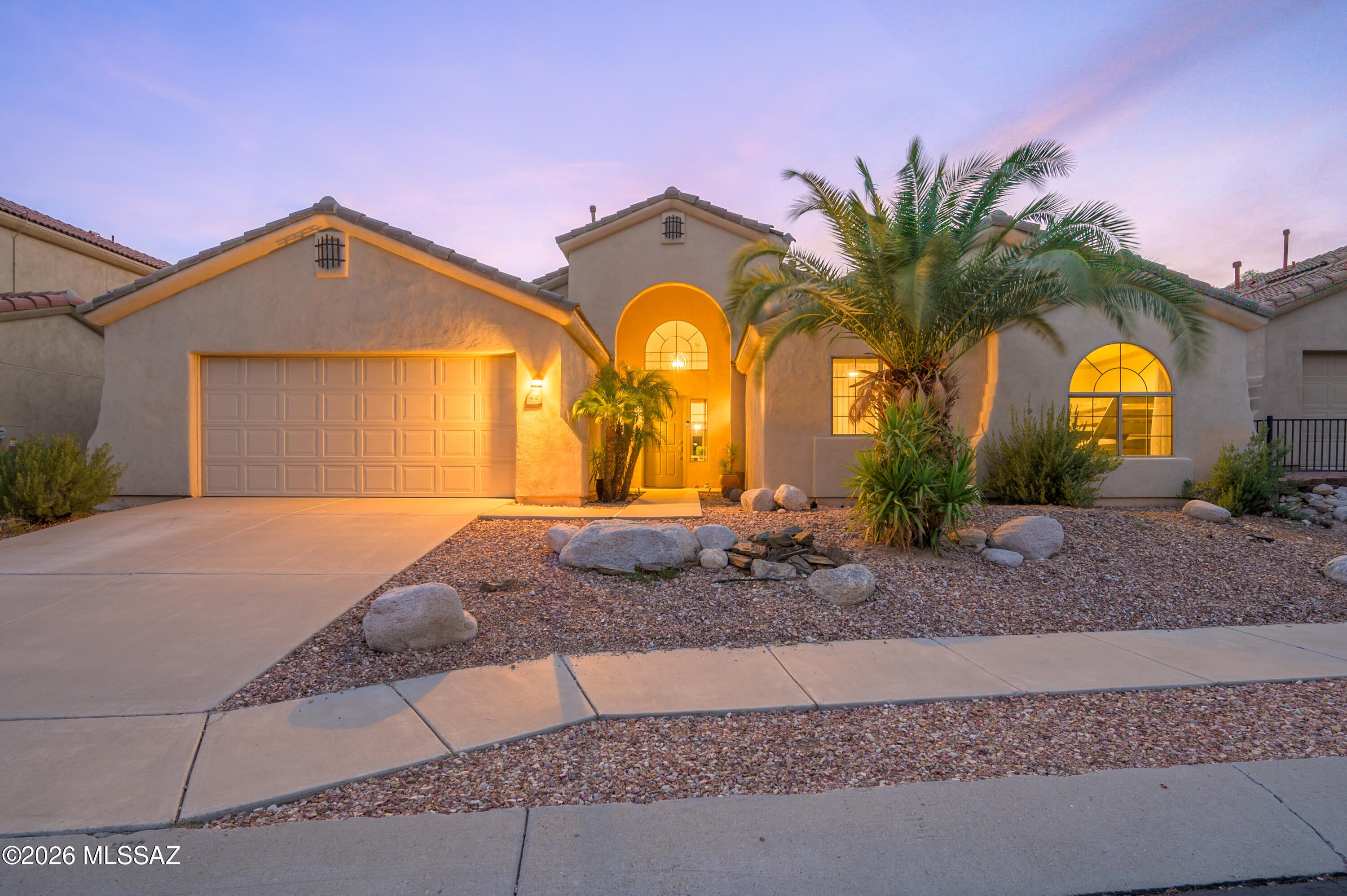 Gated Sabino Mountain living with the privacy buyers rarely find - no rear neighbors. This 2,236 sq ft, 4-bedroom, 2-bath home lives all on one level with no interior steps and high ceilings that carry light through every room. The kitchen has been fully updated, both baths reimagined in quartz with sleek modern finishes, and a gas fireplace anchors the family room. Out back, the patio opens to desert and sky instead of a fence line -- the stillness people move to the Foothills for. Behind the gates of one of Tucson's most sought-after Catalina Foothills enclaves, minutes from Sabino Canyon. Single-level ease, uninterrupted privacy, gated exclusivity. Easy Show with call to LA - MUST See!