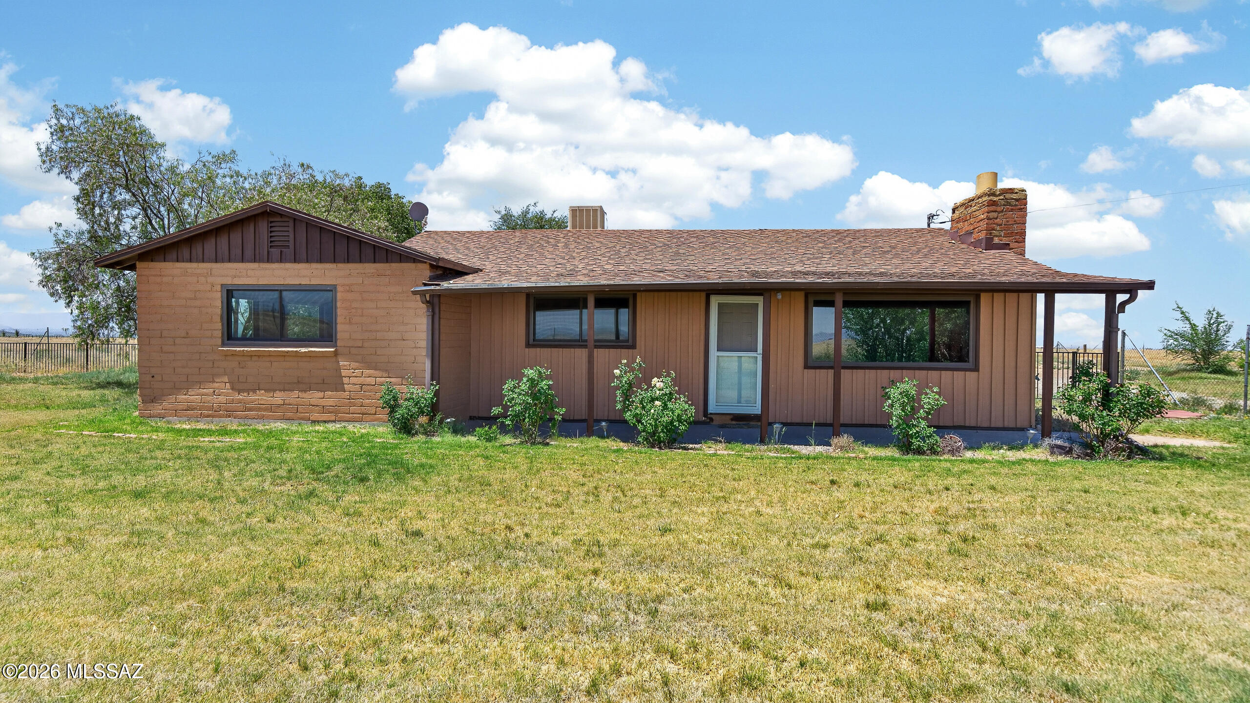 Sturdy Adobe Brick home situated on 29 acres, featuring a guest house, Private well with storage tank, barn and horse facilities. An additional 20 acres will be surveyed into a separate parcel with its own parcel number and be purchased seperately. This beautiful country property offers stunning mountain views and plenty of open space.