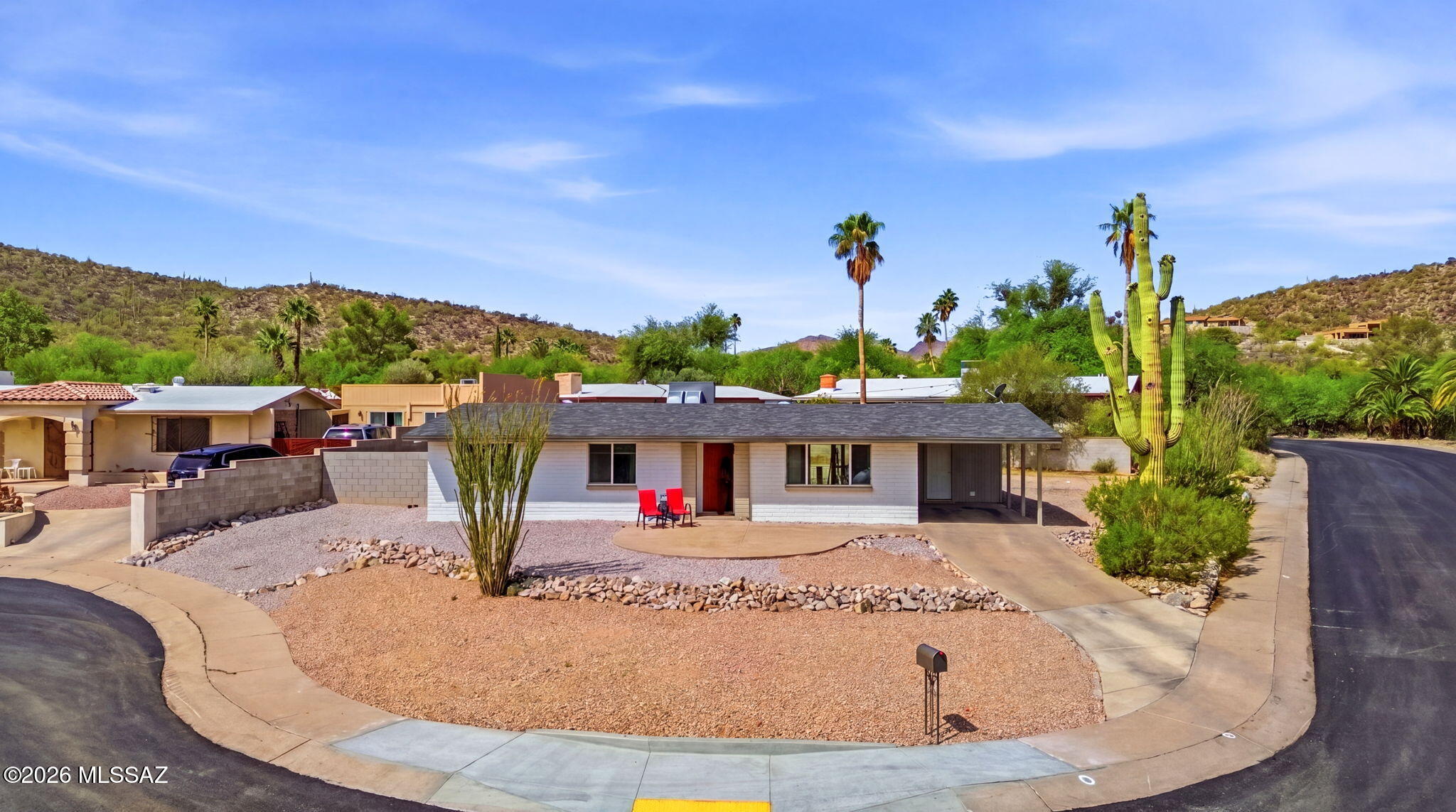 This stunning burnt adobe corner-lot home will leave you speechless. Enjoy 360-degree mountain views and a fully remodeled interior with nearly everything brand new, from the roof and HVAC to the kitchen and bathrooms.

New upgrades throughout, plus an enclosed laundry room adding extra square footage. Surrounded by top hiking trails and just minutes from downtown, shopping, golf courses, Gates Pass, and JW Marriott Starpass.

Turn-key, stylish, and completely move-in ready.