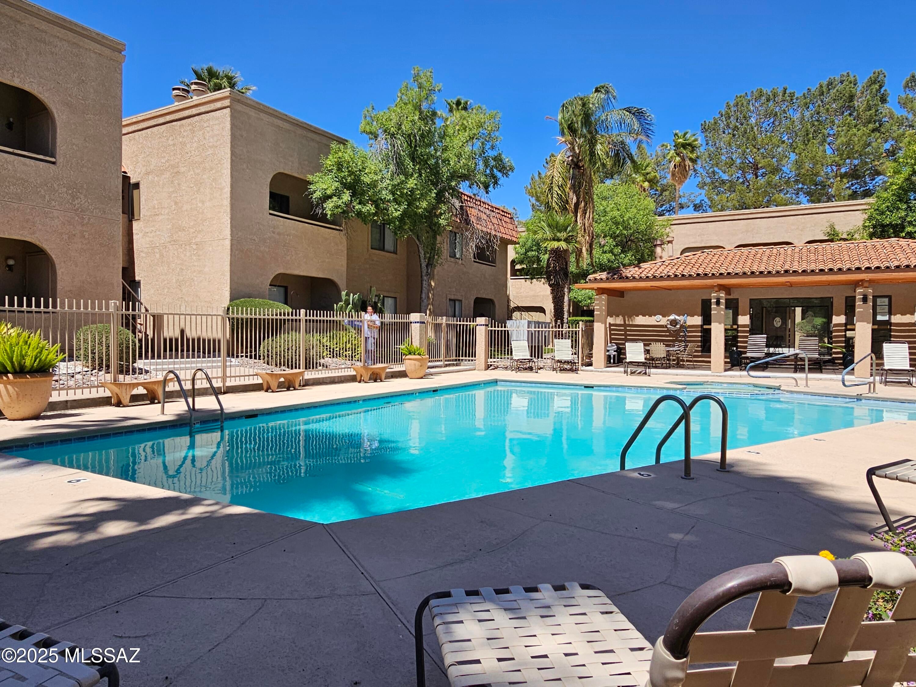 Stunning Second-Floor Retreat with Catalina Mountain Views!

This beautifully appointed 2-bedroom, 2-bath residence offers elevated living with breathtaking views of the Catalina Mountains and a direct sightline to the sparkling pool from your private balcony. Inside, you'll find a full suite of modern appliances--including an electric cooktop, oven, dishwasher, refrigerator, washer, and dryer--making daily living effortless. Fireplace with a mirrored wall surround.

Enjoy the convenience of low-maintenance living with no yard to maintain, and bring your furry companion--pets considered upon approval.  All electric home.  Water included.

Krasnick Realty represents the landlord for this exceptional property.