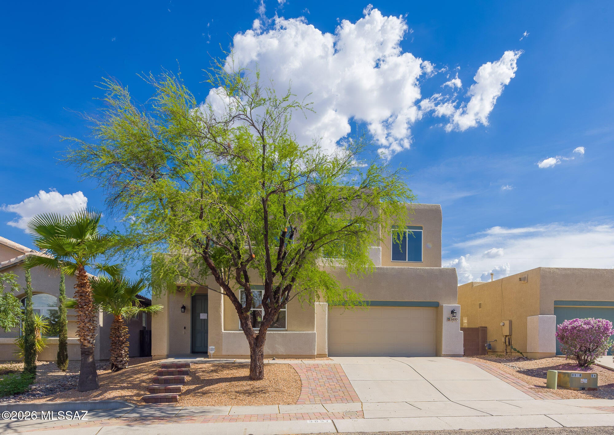 Great West Side location!! Desert Star is a small community near Pima College, the downtown hub, Gates Pass, the mountains, natural desert, and amenities galore.  This home is a Spacious 4 BR plus Office/Den, that has many unique features. The impressive 15 ft ceilings upon entrance appears to go up forever and is in-view of an upstairs interior balcony. It is an attention grabber. The entire interior is freshly painted white, which is a blank canvas for a buyer to create their dream home. The brand new kitchen appliances are unused (excluding the dishwasher) and hard to resist. Of course you cant miss the beautiful engineered hard wood floors,  they have been freshly polished and can be a focal point for the new owners interior design ideas. There are no window treatments because it is to hard to cover the views out of most every window. 
Due to the homes 2400 sq ft size one has many options here, including a potential for multi-generational family or an owner that works from home and needs office space. The property placement is near the end of a cul-de-sac with a desert surround.
There is leased solar with a lower than most payment of 81 per mo.

Come and take a look, see if it is your fit.