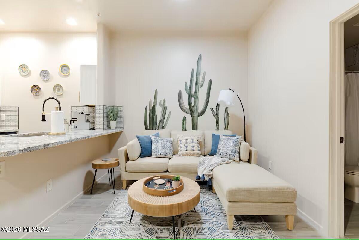 Welcome to this beautifully updated 2-bedroom, 2-bathroom turn-key condo located on the first floor in the highly sought-after Placita Escondida Condominiums. Currently operating as a successful Airbnb, this fully furnished unit is truly move-in or rent-ready, perfect for investors or homeowners seeking immediate income potential.

Renovated in 2023, the condo features modern upgrades throughout, including granite countertops, stainless steel appliances, and stylish tile flooring. The open and inviting interior comes fully stocked and thoughtfully decorated, offering a seamless experience for guests or residents alike. In-unit washer and dryer included. Prime interior location close to the community pool with ample guest parking nearby. Situated along The Chuck Huckleberry Loop with direct access to the Riverwalk and bike paths. Just minutes from St. Philip's Plaza offering dining, shopping, and entertainment. HOA covers water, trash, sewer, and access to the pool and spa. No rental restrictions--ideal for short, mid, or long-term rental strategies. Excellent opportunity for investors or owner-occupants seeking a low-maintenance property in a prime central location.
