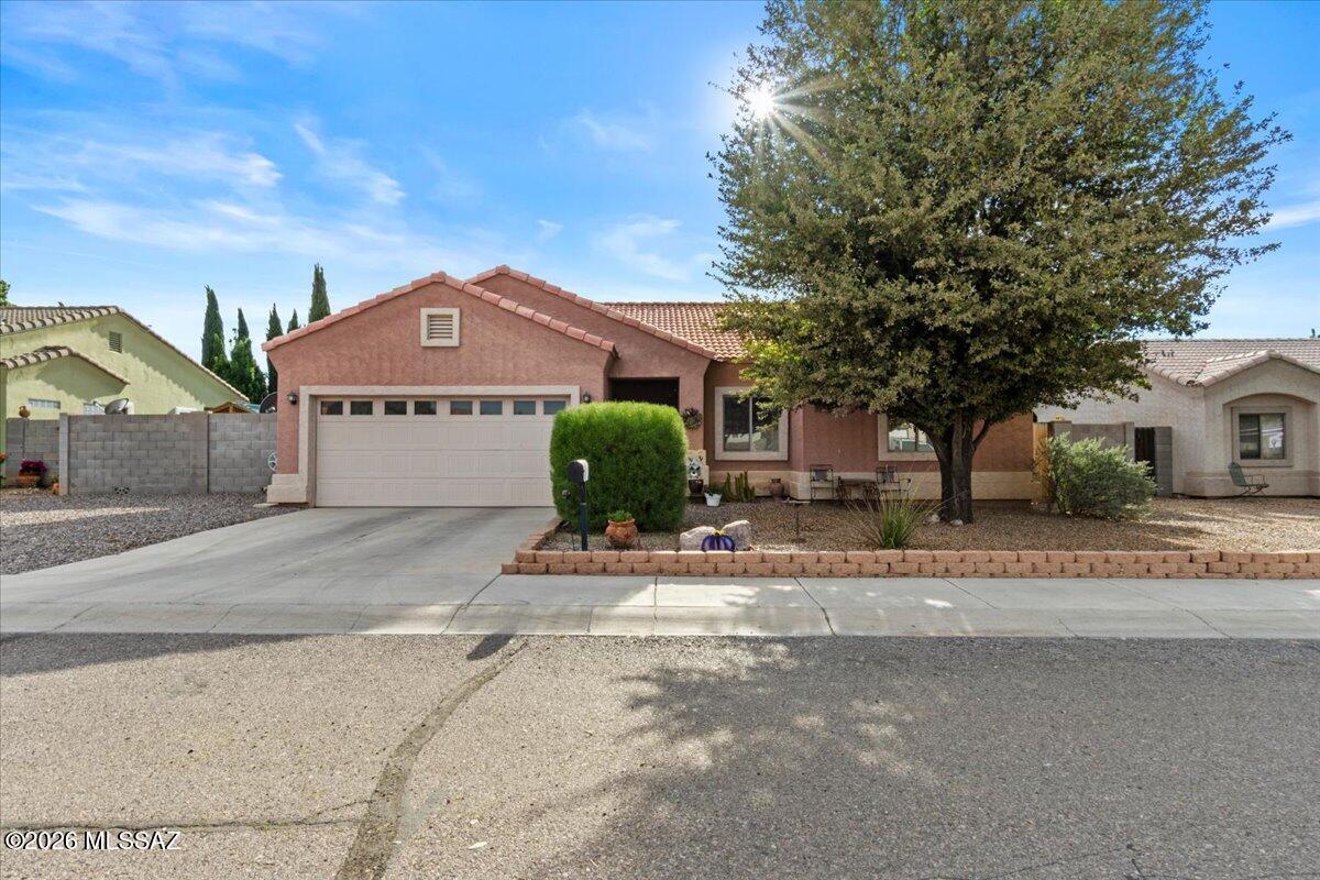 Come home to quiet evenings and mornings as you enjoy your backyard oasis with views of Mount Graham under your pergola escape!  Cota Ranch is known for its family friendly neighborhood, wide streets, and close proximity to schools and shopping.  This home is uniquely desirable as the back yard views are not obstructed by other houses.  The inside is also well taken care of and is ready for your family to relax and enjoy the day together.  At this price, it won't last long.  Call today for an appointment to walk through!
