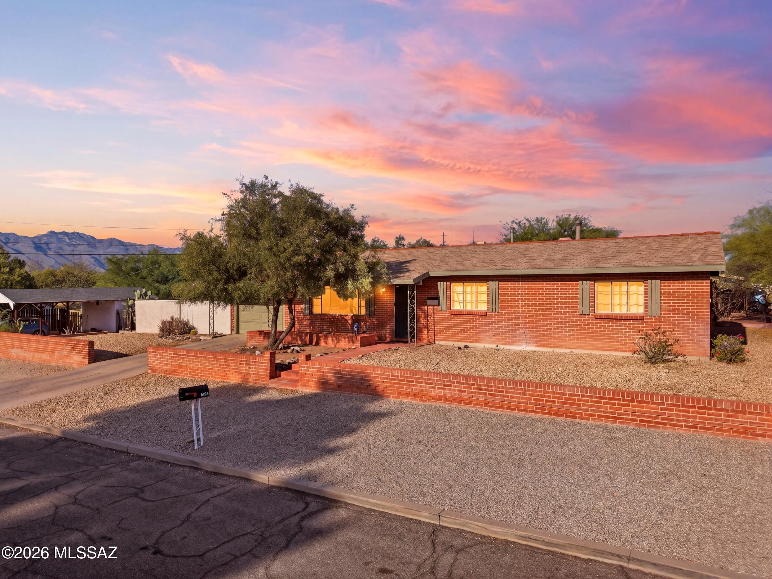 Charming 3-bedroom, 2-bath home built in 1955, located in one of Tucson's most sought-after historic neighborhoods of Blenman | Elm. Full of character and timeless appeal, this property offers classic mid-century charm with a prime location just minutes from the University of Arizona, dining, shopping, and local favorites. The home offers spacious living areas, and a location that is ideal for primary residents, students, professionals, or investors alike. A great opportunity in a highly desirable central Tucson community. Features include tile flooring throughout the main living areas, wood laminate flooring in the bedrooms, a new HVAC system, new hot water heater, a fully rewired electrical system for added peace of mind and fresh interior paint. Owner/Agent. The home includes a garage with an additional storage room, providing extra space for hobbies, storage, or workspace needs. Plenty of room for additional parking, wood plantation shutters , new ceiling fans and disposal. The neighborhood of Blenman-Elm sits on nearly a square mile just east of the University of Arizona Medical Center, offering a highly sought-after central Tucson location with enduring historic character. Just blocks from the elegance of the Arizona Inn, the neighborhood blends charm, convenience, and a strong sense of community.

Imagine mornings spent exploring nearby coffee shops or participating in the neighborhood's well-known Home & Garden Tour that showcases its unique architectural character and pride of ownership. With its walkable setting and established streetscapes, Blenman-Elm offers an inviting lifestyle rooted in connection and convenience.

Ideally located just about 3 miles north of downtown Tucson and minutes from the University of Arizona, the area provides easy city commutes while maintaining a peaceful residential feel. Residents appreciate the strong community vibe, historic charm, and everyday walkability that make this neighborhood one of Tucson's most enduring and desirable locations.