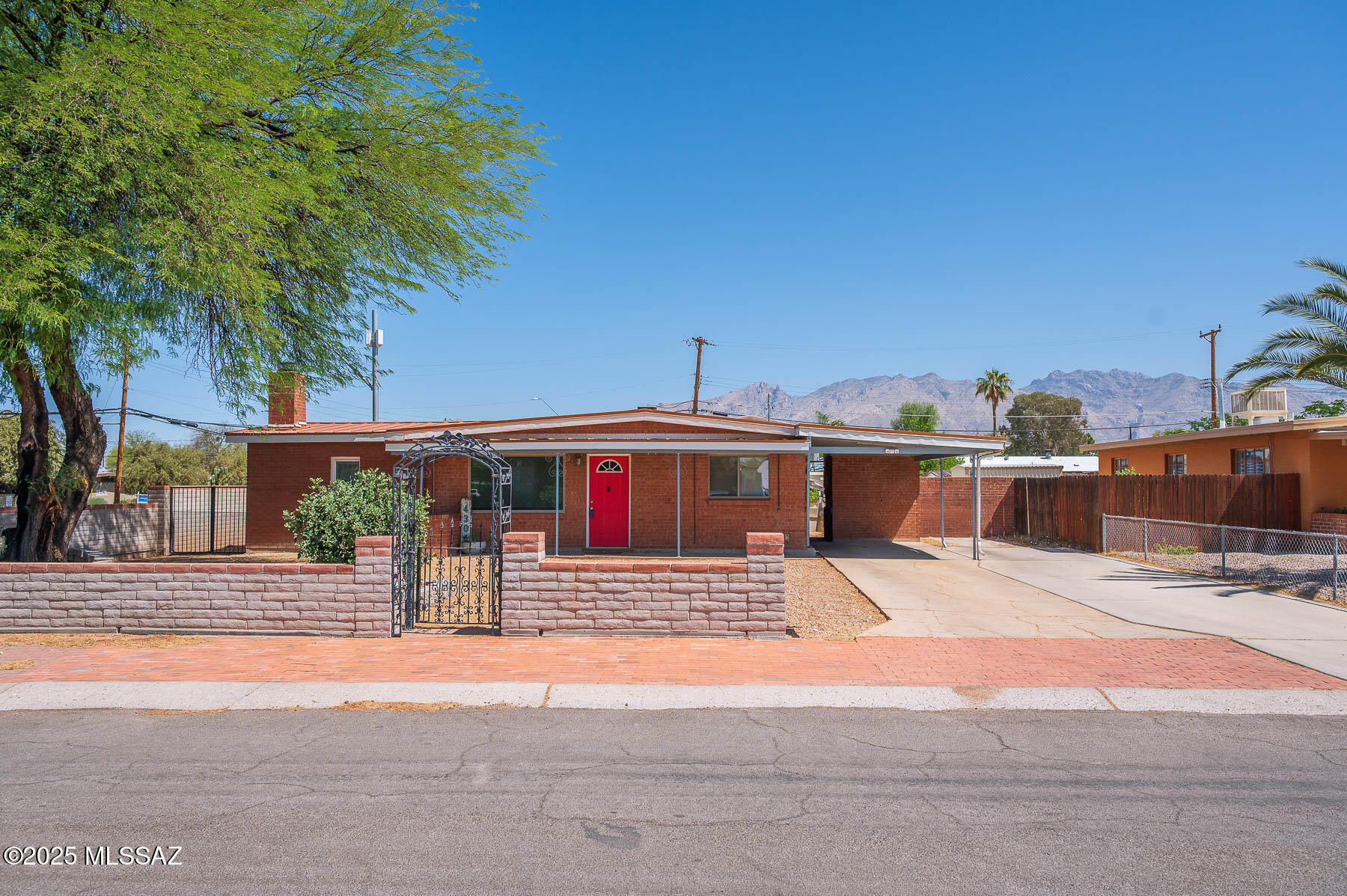 You don't want to miss this this large corner lot brick home! This home has been remodeled throughout and has updated finishes! This 3 bed 2 bath home offers an open floor plan and SPACIOUS backyard with a large workshop/garage and covered RV Parking! close to amenities with mountain views!. Alley access and large metal gate to park your toys! 

Owners of LLC are licensed real estate professionals in the state of Arizon