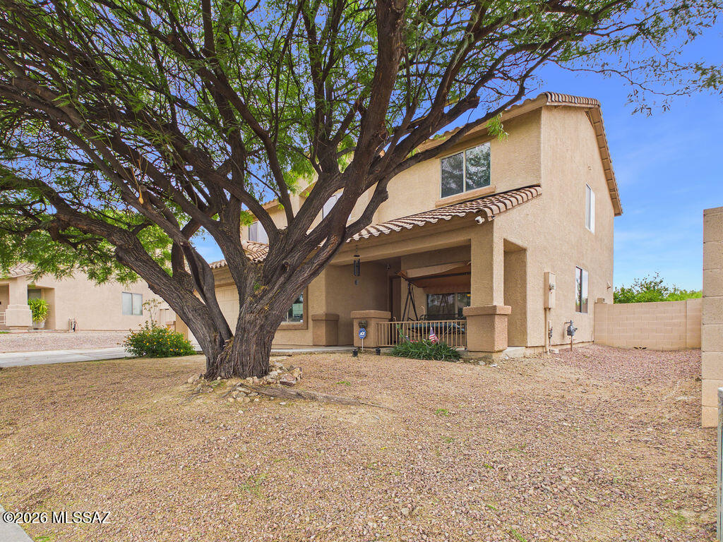 Spacious 5-bedroom, 3-bathroom home with a flexible floor plan, located in a desirable Tucson neighborhood! This large family home offers plenty of room to live, work, and entertain, including a dedicated office/den perfect for remote work or a quiet retreat.

Step inside to find multiple living areas featuring tile flooring, warm finishes, and abundant natural light. The open kitchen is equipped with ample cabinetry, granite countertops, a large island, and plenty of prep space--ideal for hosting gatherings or everyday living. The adjoining dining and family areas create a seamless flow throughout the main level. The primary suite provides a comfortable escape with a spacious layout, dual vanity, soaking tub, and separate shower. Additional bedrooms are generously sized, offering flexibility for guests, family, or hobbies.

Enjoy Arizona living outdoors with a large backyard that offers endless potential--perfect for entertaining, relaxing, or creating your own desert oasis. The covered patio provides shade and space for outdoor dining, while the extended yard gives you room to customize.

Additional highlights include a 2-car garage, upstairs balcony with mountain views, and a versatile layout that accommodates a variety of lifestyles.

Conveniently located near shopping, dining, and easy access to major roads, this home offers both space and opportunity.