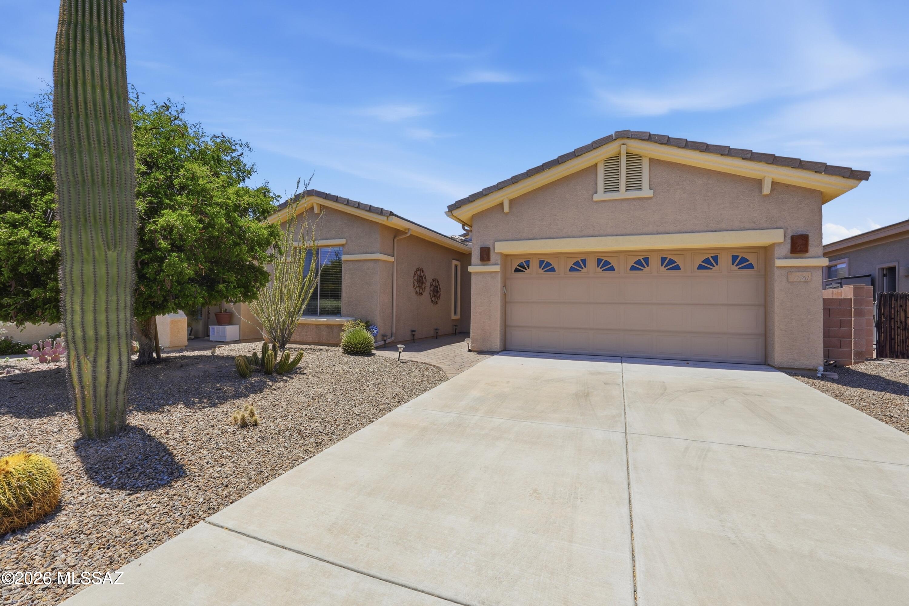 Incredible Opportunity in the GATED Preserve of Dove Mountain - Immaculate gem on a quiet cul-de-sac. The open-concept layout stuns with 12-ft ceilings, custom flooring, surround sound, and a grand great room anchored by a gas fireplace. Gourmet kitchen impresses & massive quartz island, stainless gas appliances, mosaic backsplash, solid wood cabinets, and a large pantry. The main retreat offers backyard access, dual vanities, soaking tub, and a walk-in closet. Step outside to a serene desert oasis with COMPLETE PRIVACY. 3-car tandem garage, Milgard windows with lifetime warranty, new water heater, and washer/dryer included. Minutes from fine dining, shopping, the Ritz-Carlton, and the legendary Jack Nicklaus 27-hole golf course. Community parks, tennis courts & walking paths. Zoned HVAC! complete the lifestyle. This one is truly special.