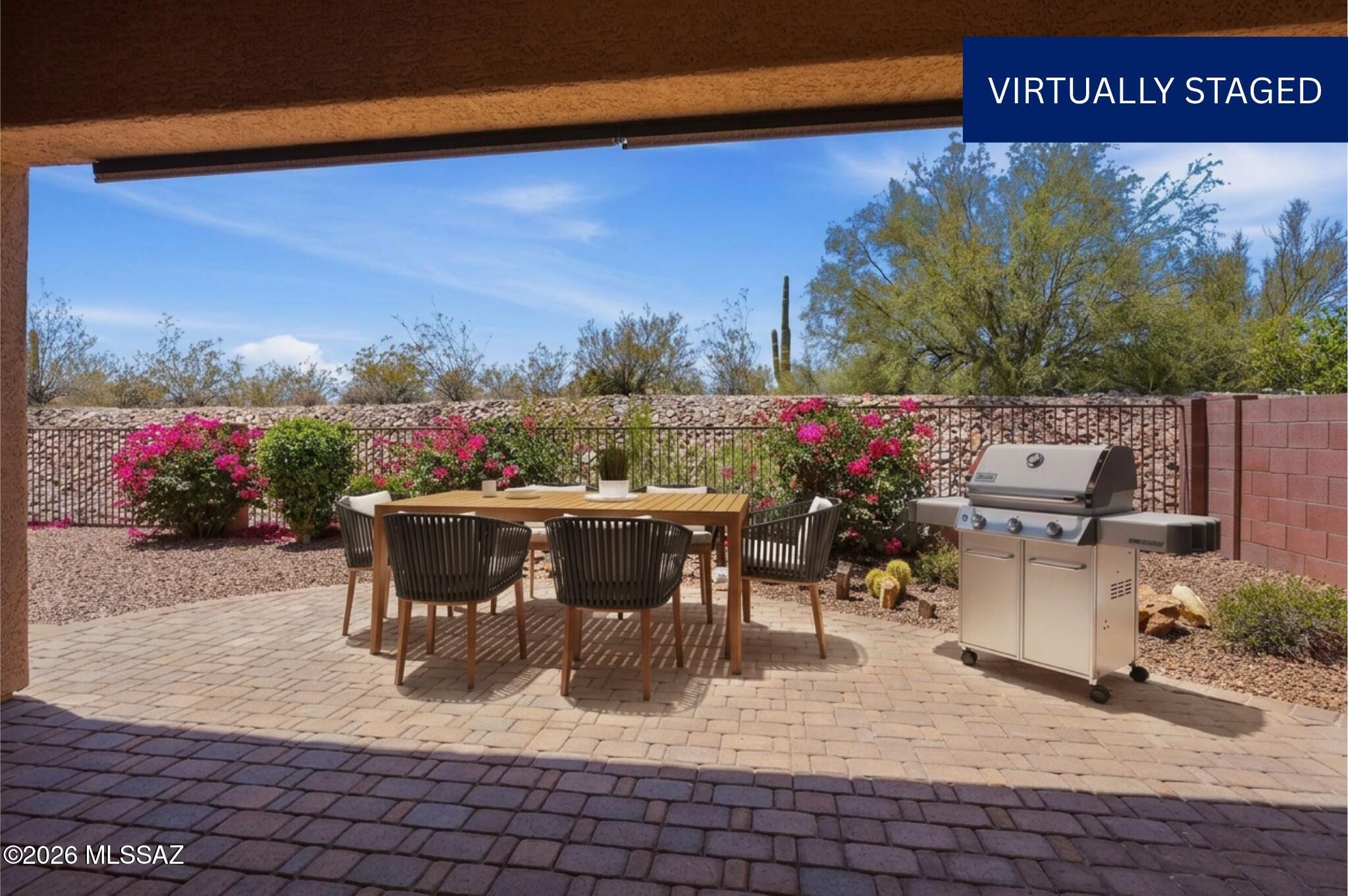 Incredible Opportunity in the GATED Preserve of Dove Mountain - Immaculate gem on a quiet cul-de-sac. The open-concept layout stuns with 12-ft ceilings, custom flooring, surround sound, and a grand great room anchored by a gas fireplace. Gourmet kitchen impresses & massive quartz island, stainless gas appliances, mosaic backsplash, solid wood cabinets, and a large pantry. The main retreat offers backyard access, dual vanities, soaking tub, and a walk-in closet. Step outside to a serene desert oasis with COMPLETE PRIVACY. 3-car tandem garage, Milgard windows with lifetime warranty, new water heater, and washer/dryer included. Minutes from fine dining, shopping, the Ritz-Carlton, and the legendary Jack Nicklaus 27-hole golf course. Community parks, tennis courts & walking paths. Zoned HVAC! complete the lifestyle. This one is truly special.