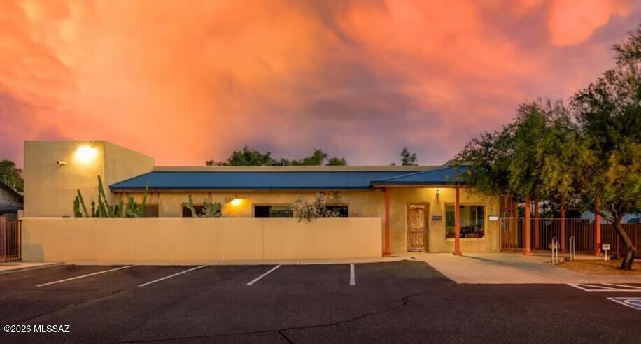A great investment opportunity in Central Tucson Office Location & High Quality of Construction in a fully Gated/Secured Compound. This dual office suite
layout consists of a dental suite (approx 1,809sqft - presently occupied - 7 year lease) built out with 5 exam rooms, a Doctor's office, waiting room and
reception area, a break room, storage, lab and 2 restrooms.
office/dance space with a gorgeous sprung maple wood floor system. The great room can be divided with a wall accordion, 3 private office suites, two
bathrooms (one ADA Compliant), a reception area, private outdoor space and so much more. The vacant suite has the opportunity for multiple possible
configurations for office