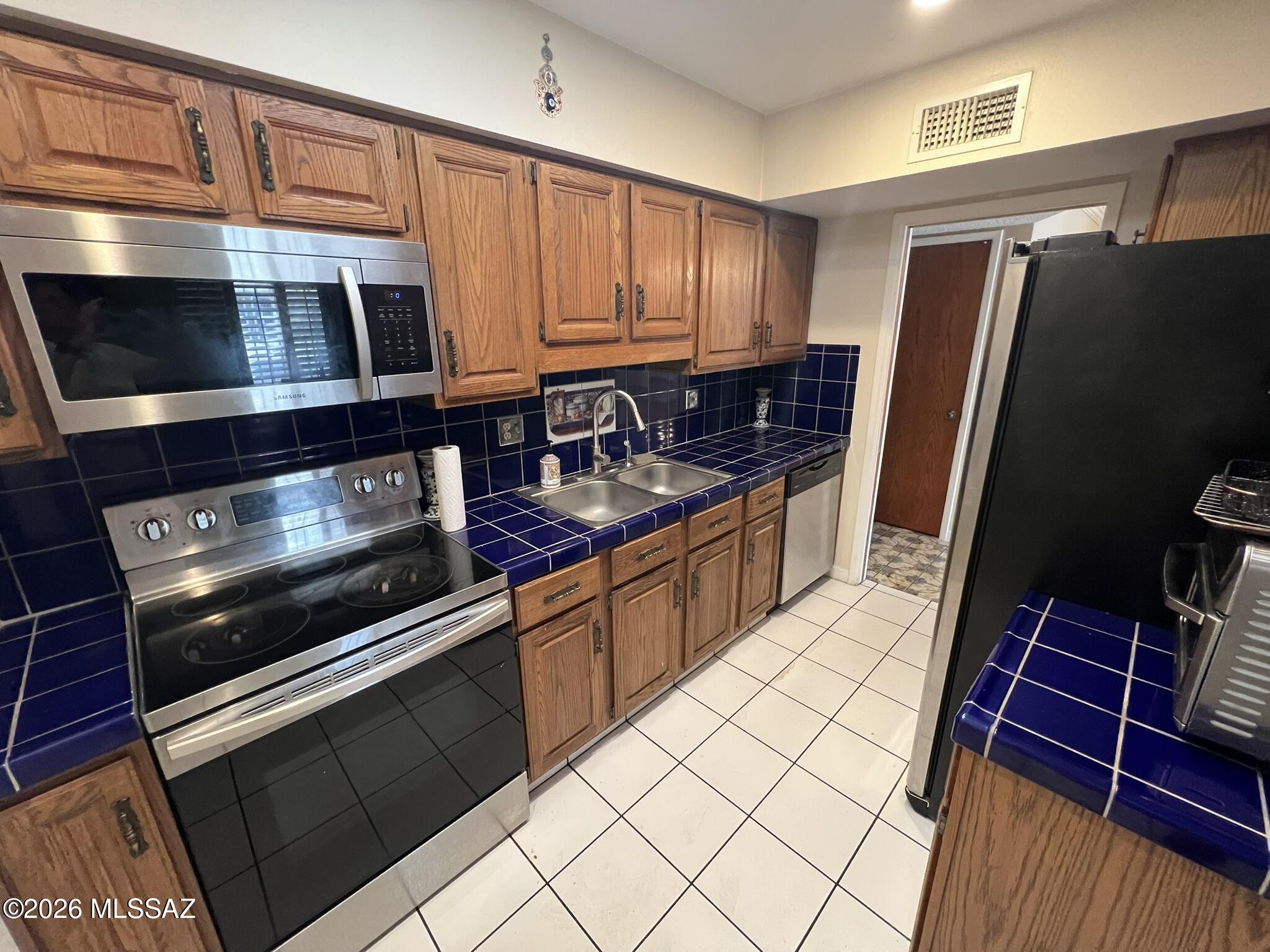 Cash only opportunity in a quality eastside location across from Dorado Golf Course. This 2 bedroom, 2 bathroom home offers good interior condition, a 2-car carport, and access to the community pool. Property does need a new roof, creating a great opportunity for an investor, renovator, or buyer looking to add value. Conveniently located near golf, shopping, dining, and everyday amenities. Submit highest and best offer by end of day April 9th.