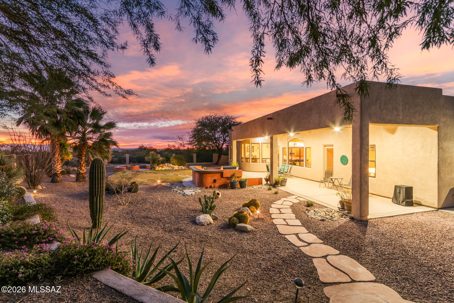 Nestled in the gated Sycamore Hills Estates, this beautiful home sits on 1.5 acres and offers privacy, space, and stunning views of the Santa Rita Mountains. Enjoy breathtaking sunrises and sunsets in a tranquil setting designed for relaxed desert living. The home features a split floor plan with 3 bedrooms, 2.5 bathrooms, and approximately 3,000 sq ft of comfortable living space. Conveniently located with easy access to I-10, Raytheon, the University of Arizona Tech Park, and a quick drive to Davis-Monthan Air Force Base. Located in the highly regarded Vail School District, this property blends serenity with convenience in a gated community