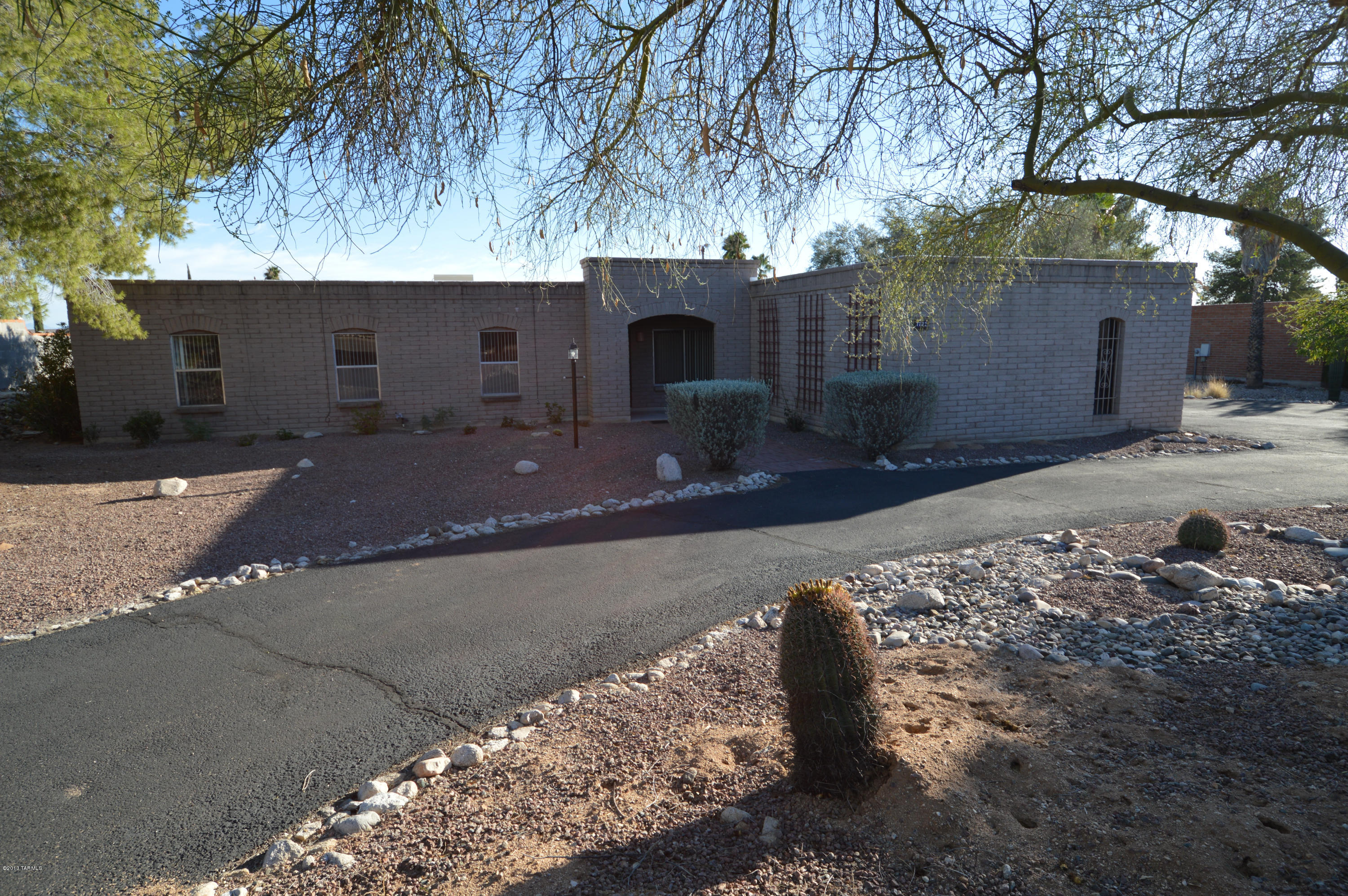 Terrific location in prestigious Sabino Vista Knolls. Classic territorial home is waiting for your family. Gracious and open floor plan with family room off gourmet kitchen. Huge, covered patio overlooks walled yard with sparkling swimming pool. Dual cooling for comfort and economy. Professionally landscaped. Double garage with lots of storage. This one won't last long...SO CALL NOW!!