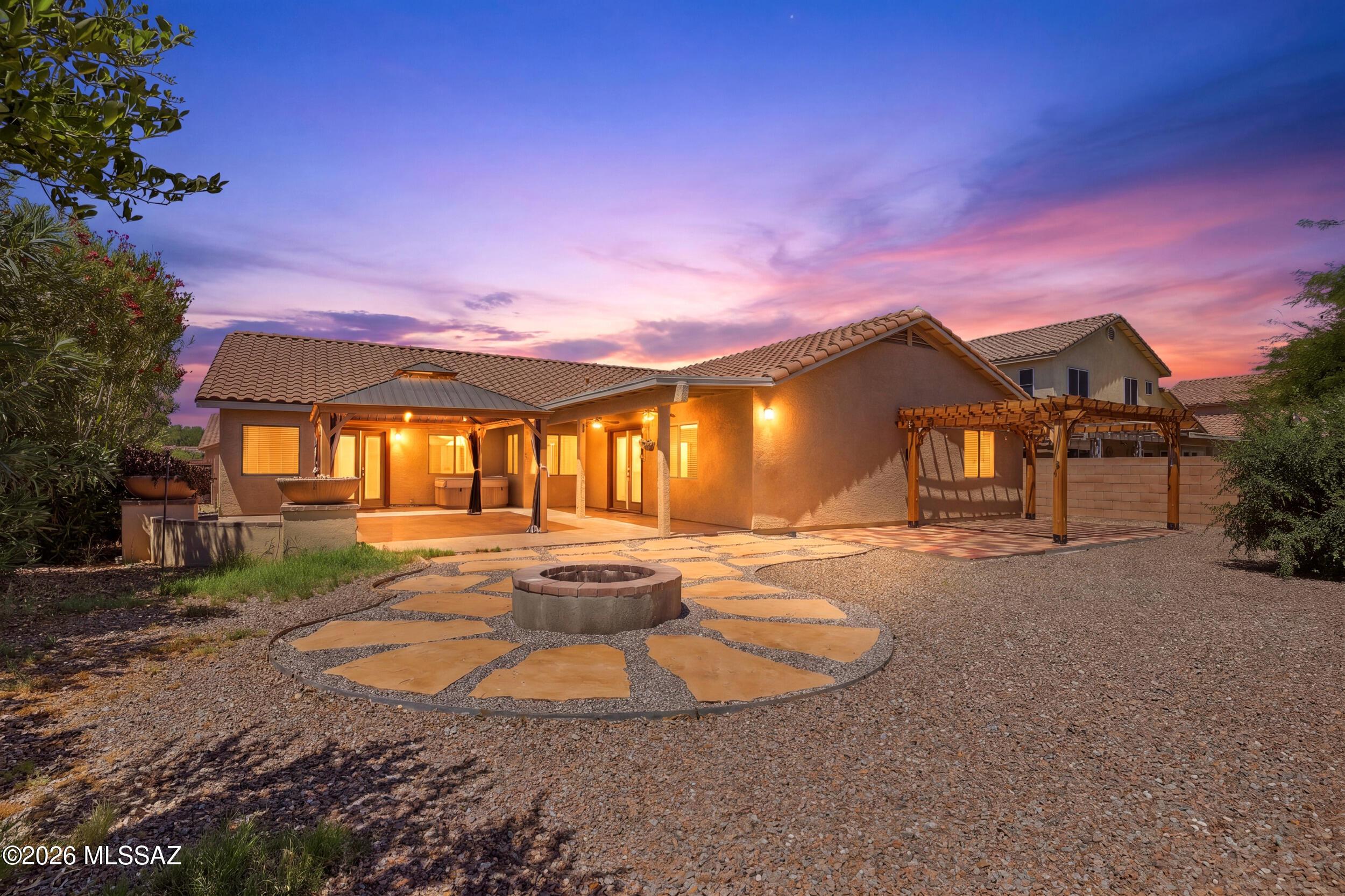 Welcome to Star Valley living at its finest! This beautifully maintained 4-bedroom, 2-bath home offers the perfect blend of comfort, space, and Arizona outdoor living. From the moment you step inside, you'll appreciate the open layout, natural light, and inviting atmosphere designed for both everyday living and entertaining. The spacious kitchen flows seamlessly into the main living areas, creating a warm and functional space for gatherings, holidays, and quiet evenings at home. The split-bedroom floorplan provides added privacy, while the generously sized bedrooms offer flexibility for families, guests, or a home office setup. Step outside and experience the true highlight of the property a backyard built for Arizona living. Enjoy evenings under the pergola, weekend BBQs with friends