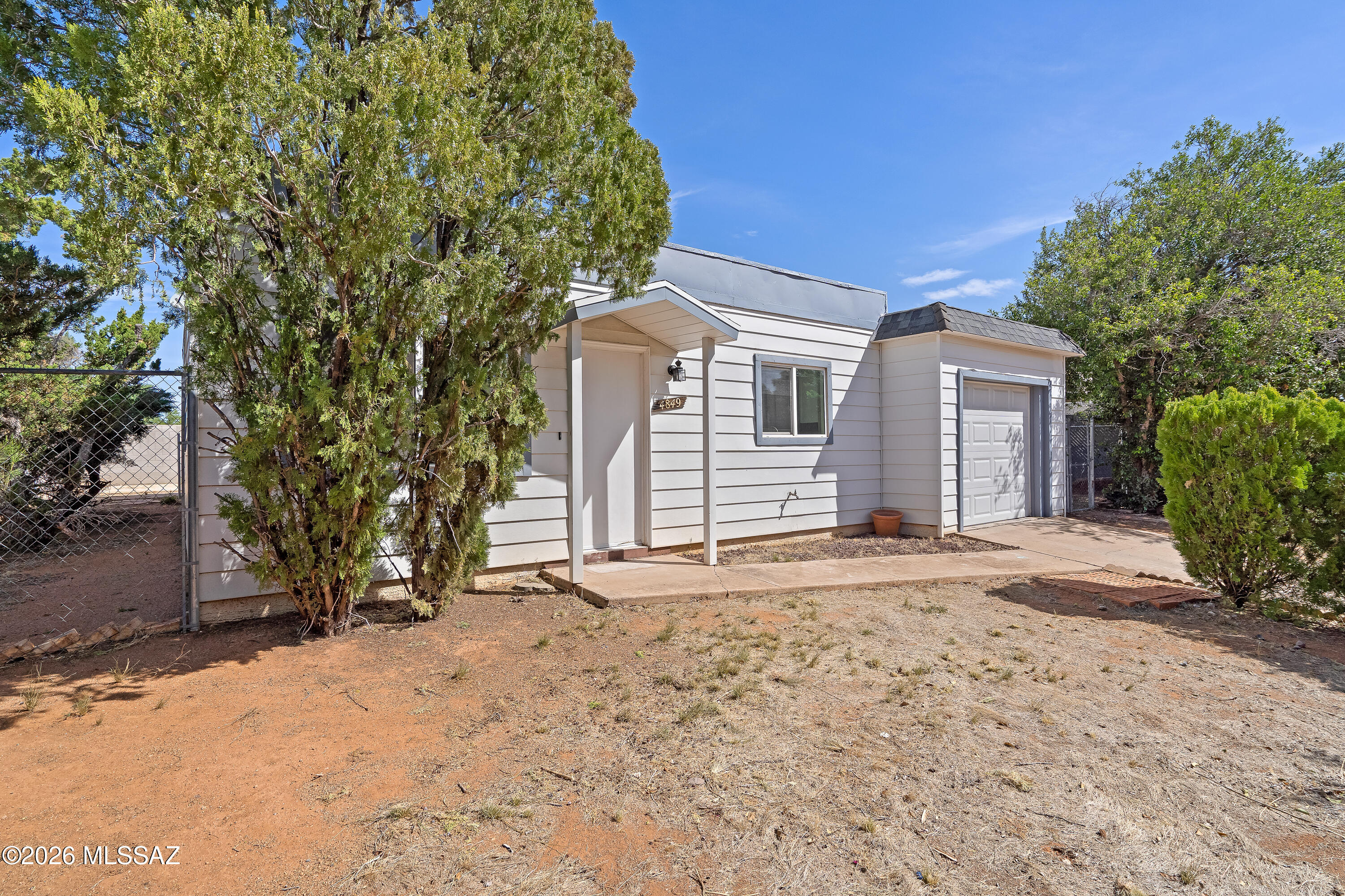 Step into this beautifully remodeled ranch-style home, where modern updates blend seamlessly with timeless charm. Conveniently located just minutes from shopping, dining, and Cochise College, this home offers the perfect balance of comfort, style, and accessibility.

The thoughtfully updated kitchen features sleek stainless-steel appliances, modern finishes, and a functional layout designed for both everyday living and effortless entertaining. The spacious living room is highlighted by a stunning brick-accented fireplace, creating a warm and inviting focal point for gatherings or relaxing evenings at home. Dual-pane windows throughout provide abundant natural light while enhancing energy efficiency and year-round comfort. With its tasteful upgrades, classic ranch-style appeal, and desirable location, this move-in ready home offers an exceptional opportunity for homeowners seeking both convenience and modern living.