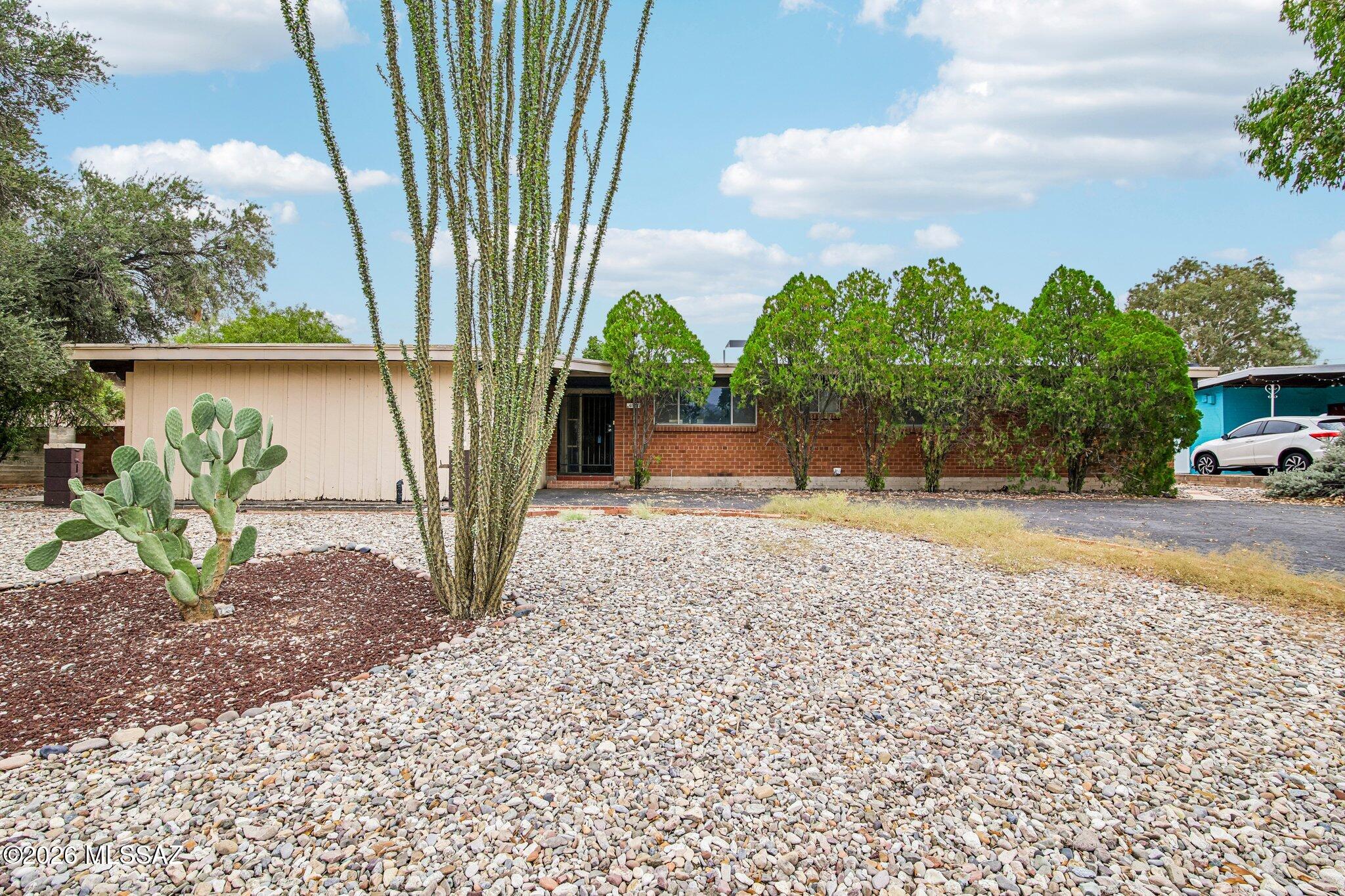 Priced to sell- Come and make it your own. Bring your vision to this 4-bedroom east side ranch on a private lot of nearly 9,400 sq ft with beautiful mountain views and no HOA. The open, easygoing layout lends itself to everyday living and entertaining. With some cosmetic updates, this home is ready to shine. A separate entrance with its own parking opens the door to multigenerational living, a guest suite, a home office, or rental income (buyer to verify use). With no HOA, you have the freedom to make this property your own. Opportunities like this on the east side don't come along often, so schedule your showing today. Sold as-is.