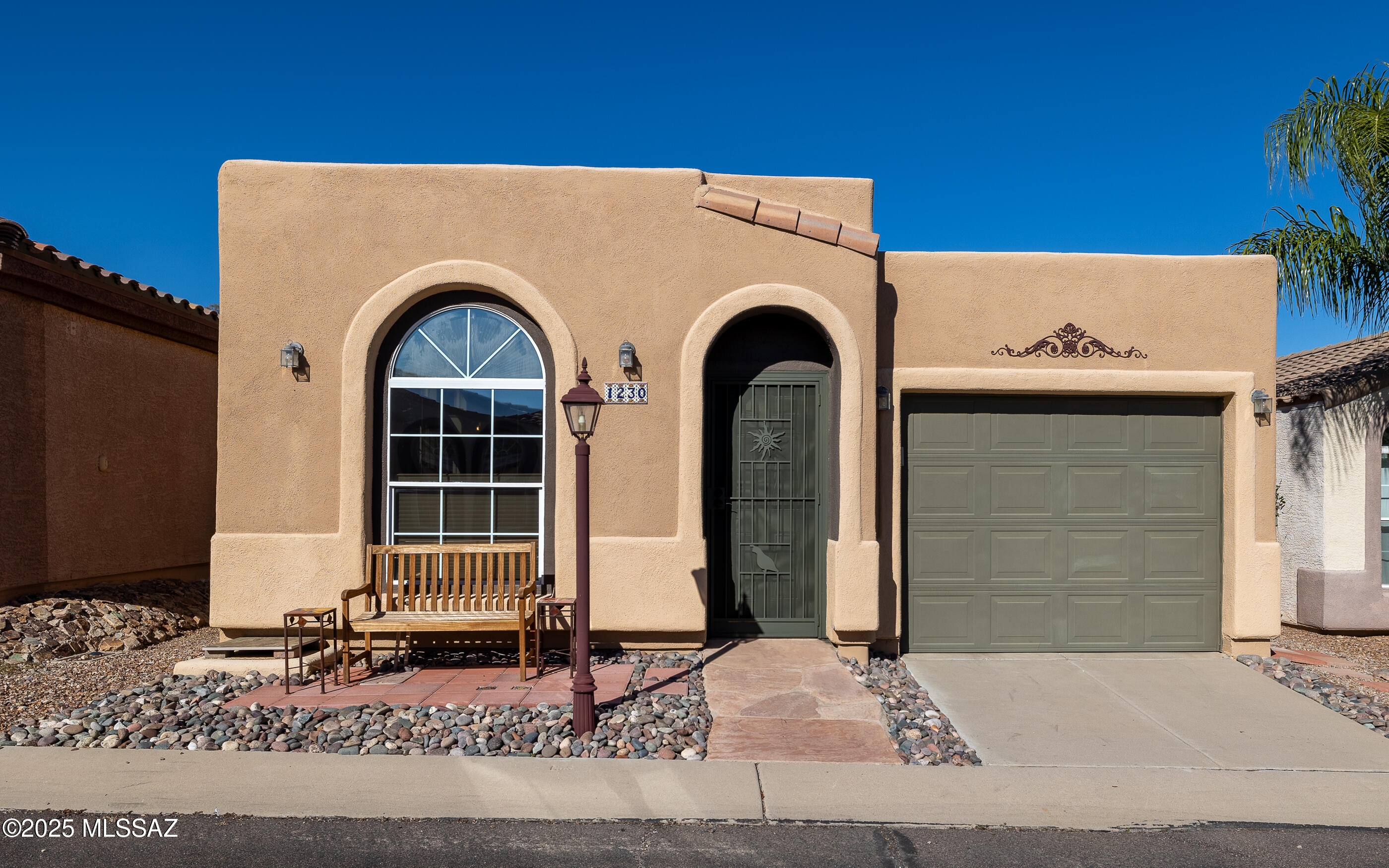 Price adjustment with Unbeatable Value in the neighborhood. Come and Discover the charm of Rancho Resort, a welcoming 55+ gated community known for its vibrant atmosphere and impressive range of amenities designed to elevate your everyday living. This home features one spacious bedroom plus one versatile bonus room-perfect for an office, den or 2nd bedroom. The bright  kitchen features,  white cabinets, a breakfast bar, and a built- in hutch, providing plenty of storage and a perfect space for entertaining. The convenient stacked washer and dryer are tucked neatly into a closet for efficient use of space. Backyard has a Pergola-covered patio extends your living space outdoors, ideal for relaxing or entertaining. Rare find Fully fenced backyard is idea for pets. Home has benefited from several updates, including new vinyl plank flooring installed in throughout the home in 2020, as well as new water heater in 2022, new HVAC system was installed for energy-efficient heating and cooling and the exterior and interior were painted offering great curb appeal and reduced maintenance. 2025 updates include new kitchen sink and faucet, new bathroom sink, faucet, toilet and medicine cabinet as well as newly painted 4-1/2" baseboards, door and trim. Community features a resort-style clubhouse, pool and spa, fitness center, pickleball and tennis, walking paths, dog park, and numerous clubs and social events. Don't miss the opportunity to make this one yours!