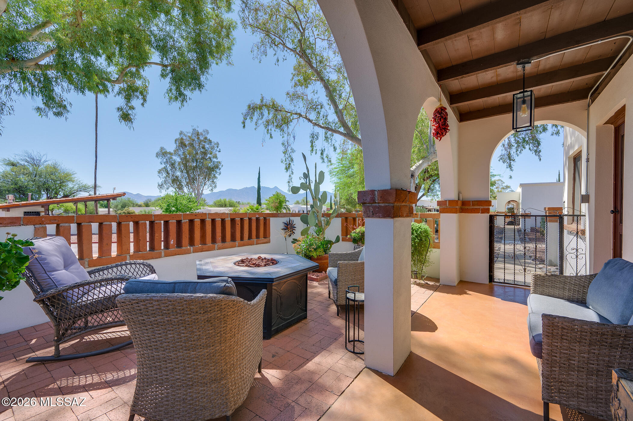 Welcome to easy desert living in Villas East! This beautifully updated 2BR/1BA condo is the perfect snowbird retreat or your full-time ''Home Sweet Desert Home.'' Step inside to your fully furnished villa to find all-tile flooring for effortless care, Hickory cabinetry, and a stylish kitchen featuring a full sized gas stove, microwave and refrigerator. The updated bath offers a sleek walk-in shower, creating a comfortable and modern feel throughout. Enjoy peace of mind with newer windows for added energy efficiency, plus a convenient laundry shed with newer washer and dryer. Outside, the courtyard patio is a true highlight--relax by the firepit, take in views of the sparkling pool just across the street, and soak up breathtaking sunrises over the Santa Rita Mountains. Low-maintenance, beautifully updated, and perfectly positioned--this one is ready for you to start living the good life!