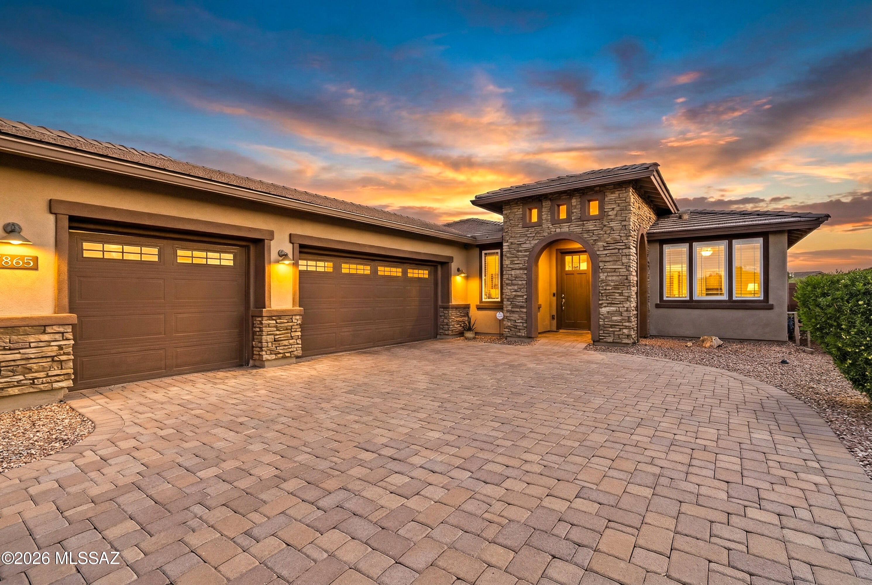 Wonderful home in the gated Blue Agave neighborhood sits on one of the largest corner lots backing to natural desert.  This lightly lived in home has complete privacy with no rear neighbors and open on one side allows for total peace and quiet. Brick paver driveway leads you to gorgeous entryway with stacked stone and 3 car garage. This 1896 sq. ft. home features 2 bed/2 bath + den with double glass French doors currently being used as an office but could easily be converted to  3rd bedroom. Gourmet chef's kitchen was designed for anybody who loves to cook and entertain.