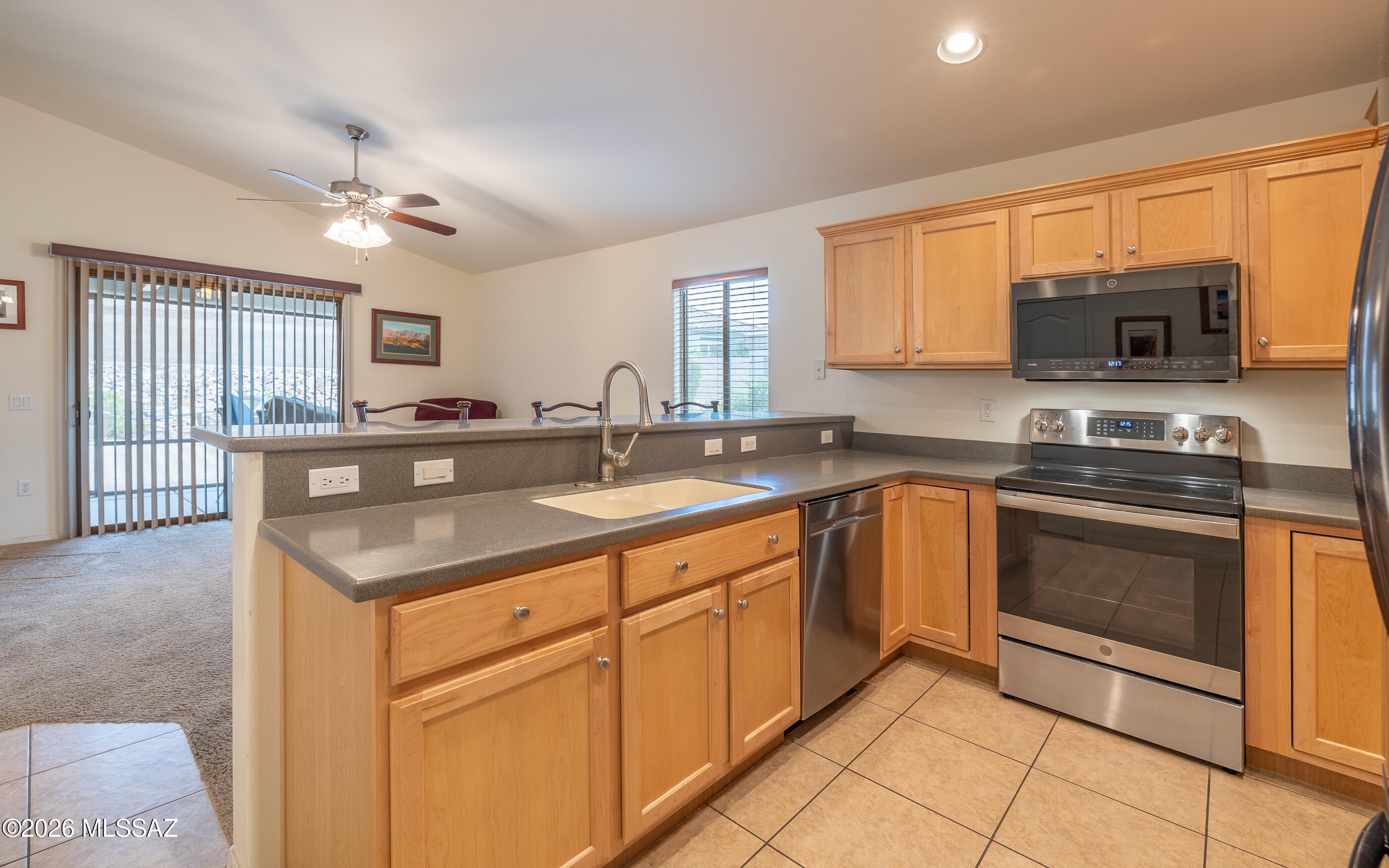 PRICED TO SELL.  Take advantage of this true Bargain in The Highlands at Dove Mountain. Monterrey floor plan home with 1727 Sq Ft; 3BR/2BA + DEN and 2 Car Garage.  Ideally located on a quiet Cul-De-Sac with convenient in and out of the North Gate.  Cook's Kitchen w/Corian Counter Tops, Wood Cabinetry and All SS Appliances included. Wonderful Owner's Suite w/Room For Any Size Bed, Walk-In Closet and BATH w/Double Vanities and Walk-In Shower.  DEN w/Double Doors.  2 Guest Bedrooms and Guest BATH. Great Room.  Family Room off Kitchen.  Covered Patio leads to Pool Sized Backyard.  Call today for a personal showing.