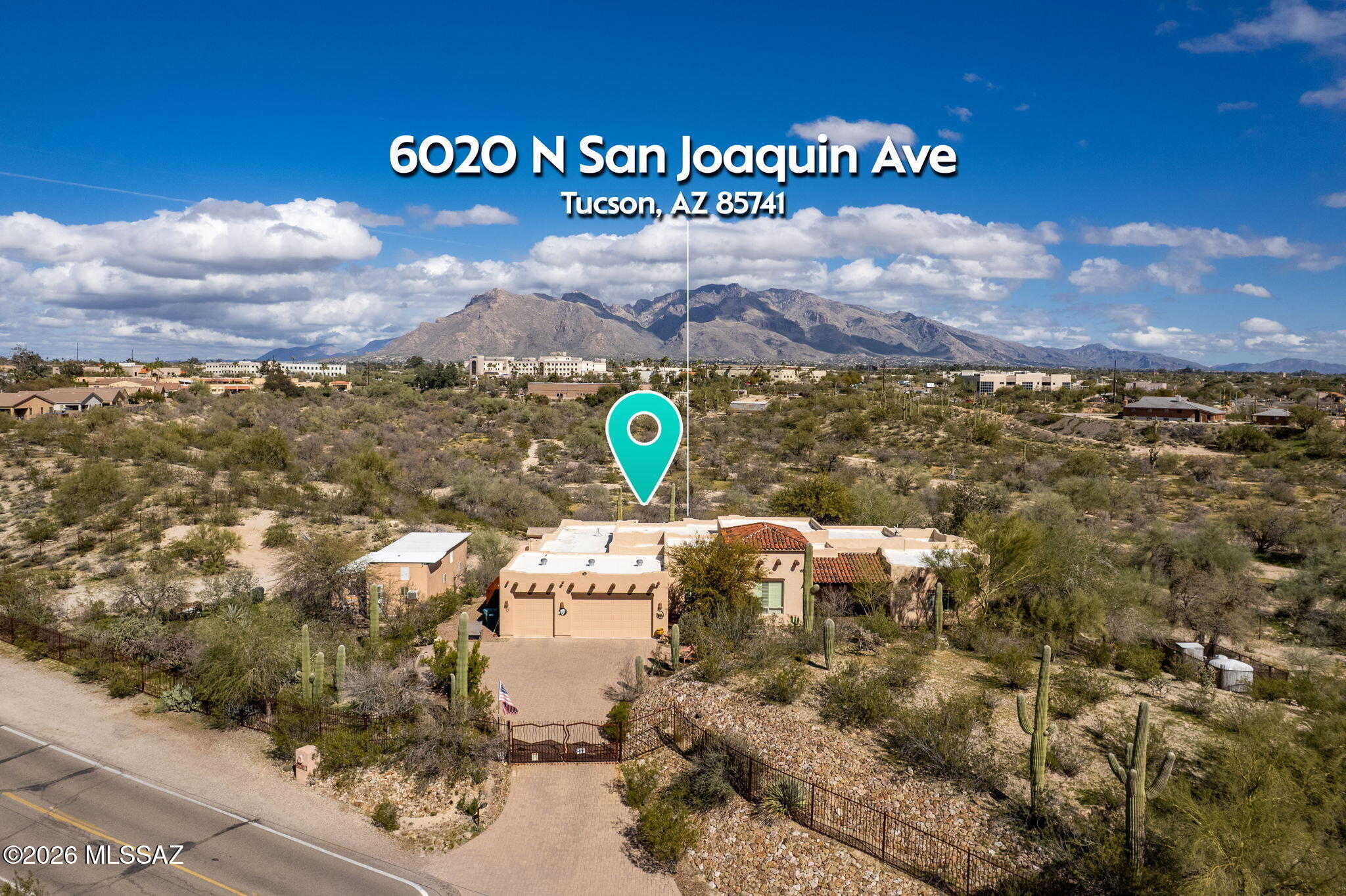 WELCOME to this rare Northwest Tucson retreat on 4.77 private acres. This 3,602 sq. ft. home features a private well, 3-car garage, RV parking with hookups, and a large workshop with power and cooling. Light-filled living, dining, and family rooms showcase soaring beamed ceilings and beautiful east-facing mountain views. Knotty alder doors and cabinetry add warmth throughout. The gourmet kitchen offers GE Monogram stainless appliances, granite countertops, walk-in pantry, and wet bar. The spacious primary suite includes a spa-like bath with natural stone, jetted tub, and oversized walk-in closet. Guest bedroom with private entrance and full bath. Enjoy the expansive covered patio and peaceful desert setting—just minutes from shopping, dining, medical, and recreation.